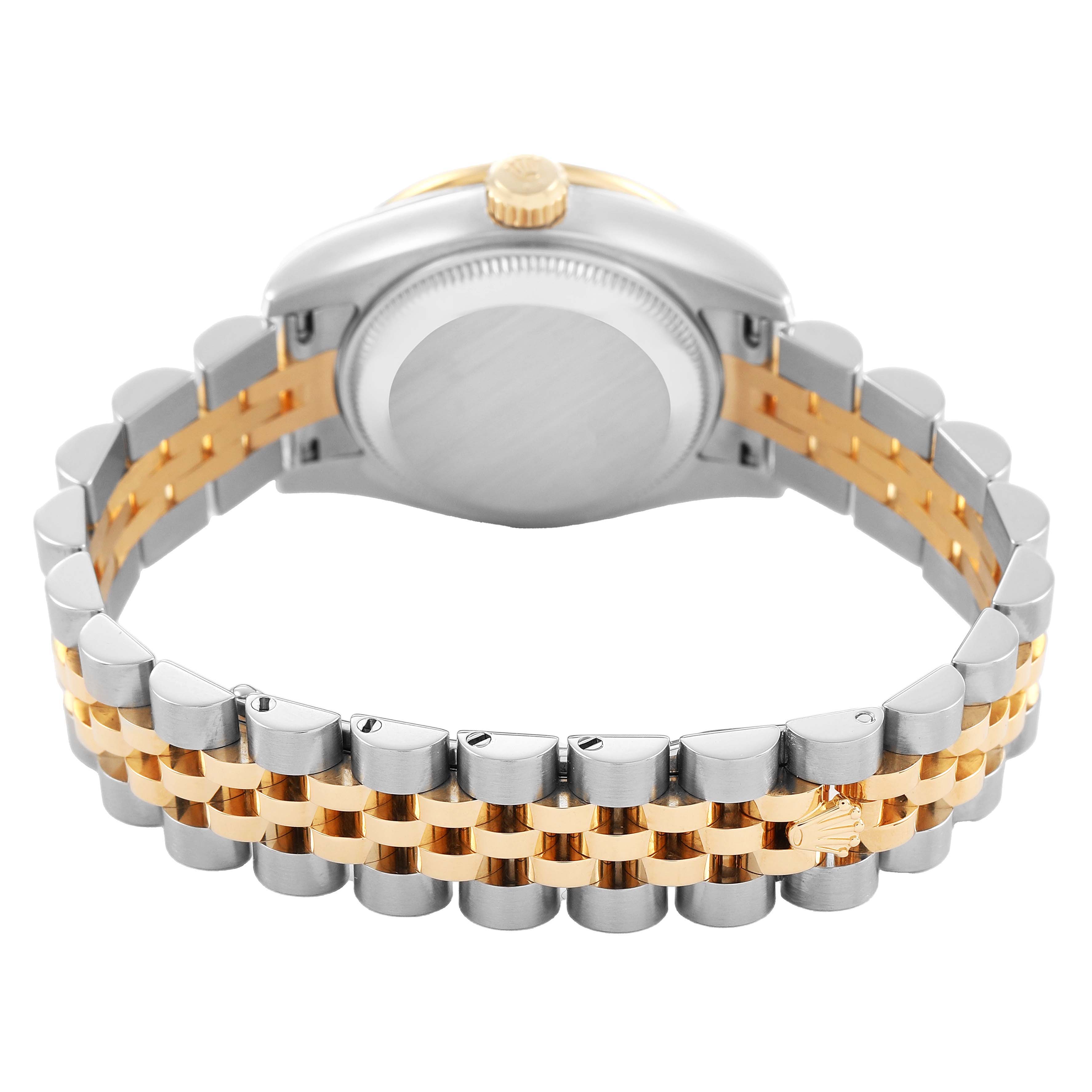 The image shows the back view of a Rolex Datejust 179383 Women's Steel and Gold (two tone) White Dial, highlighting its two-tone bracelet and case back with the crown visible.