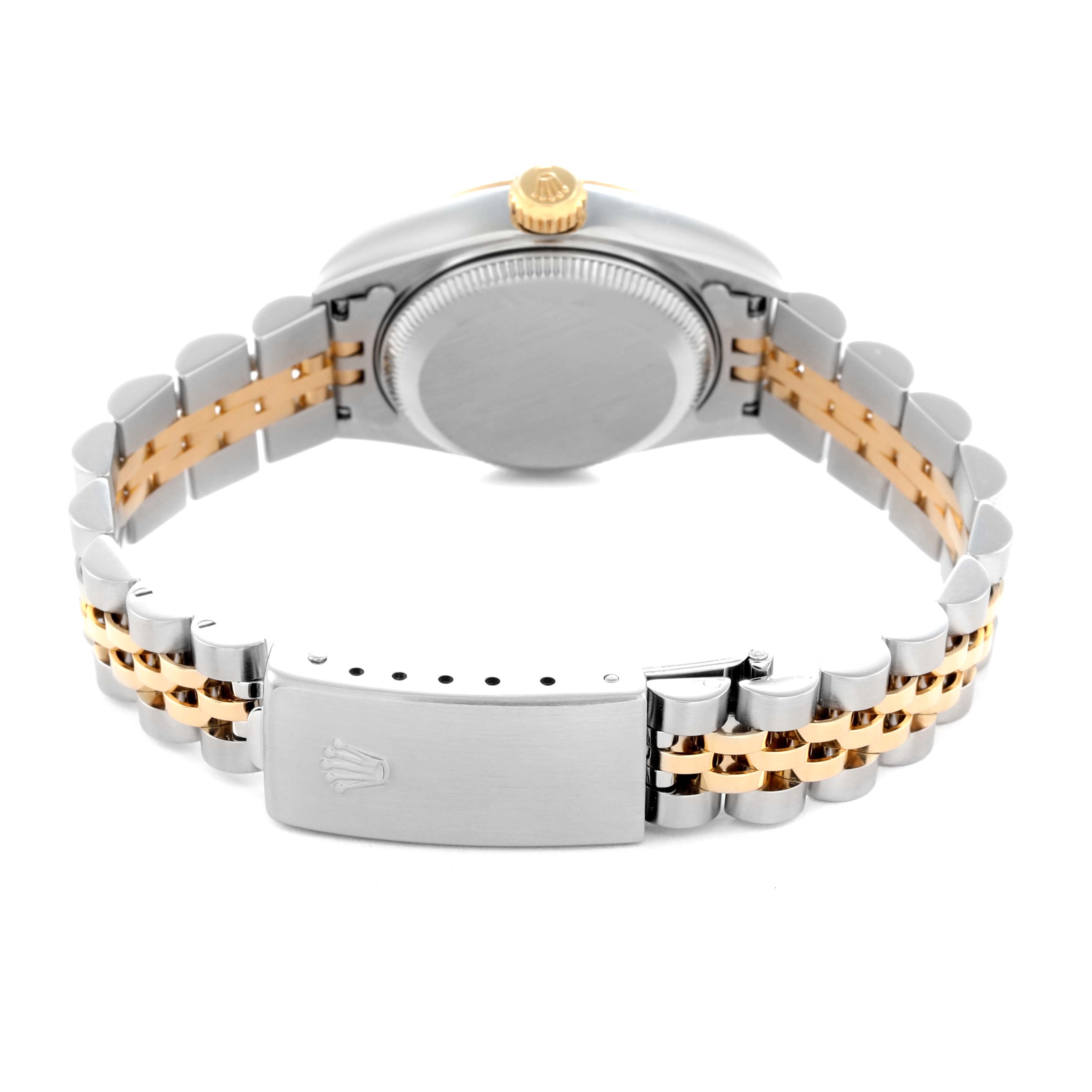 The image shows the Rolex Datejust 79173 Women
s Steel and Gold (two tone) White Dial 79173 Women
s Steel and Gold (two tone) White Dial model from the back, highlighting the bracelet, clasp, case back, and crown.