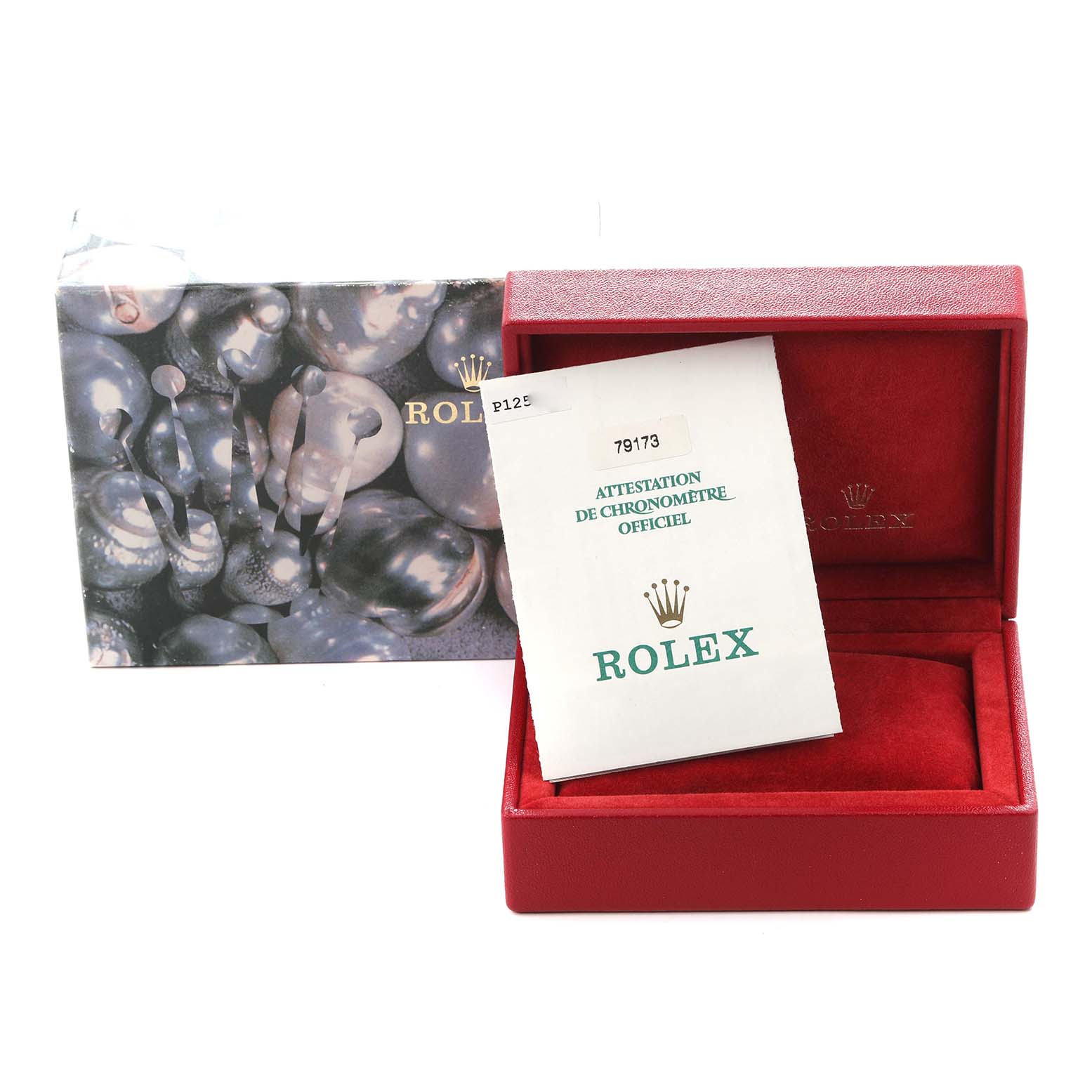 The image shows a Rolex Datejust 79173 Women
s Steel and Gold (two tone) White Dial 79173 Women
s Steel and Gold (two tone) White Dial watch box, a warranty card, and the outer packaging at a frontal angle.