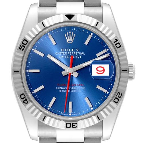 The image shows a close-up of the face and bezel of a Rolex Datejust Turn-O-Graph watch, highlighting its blue dial and red date number.