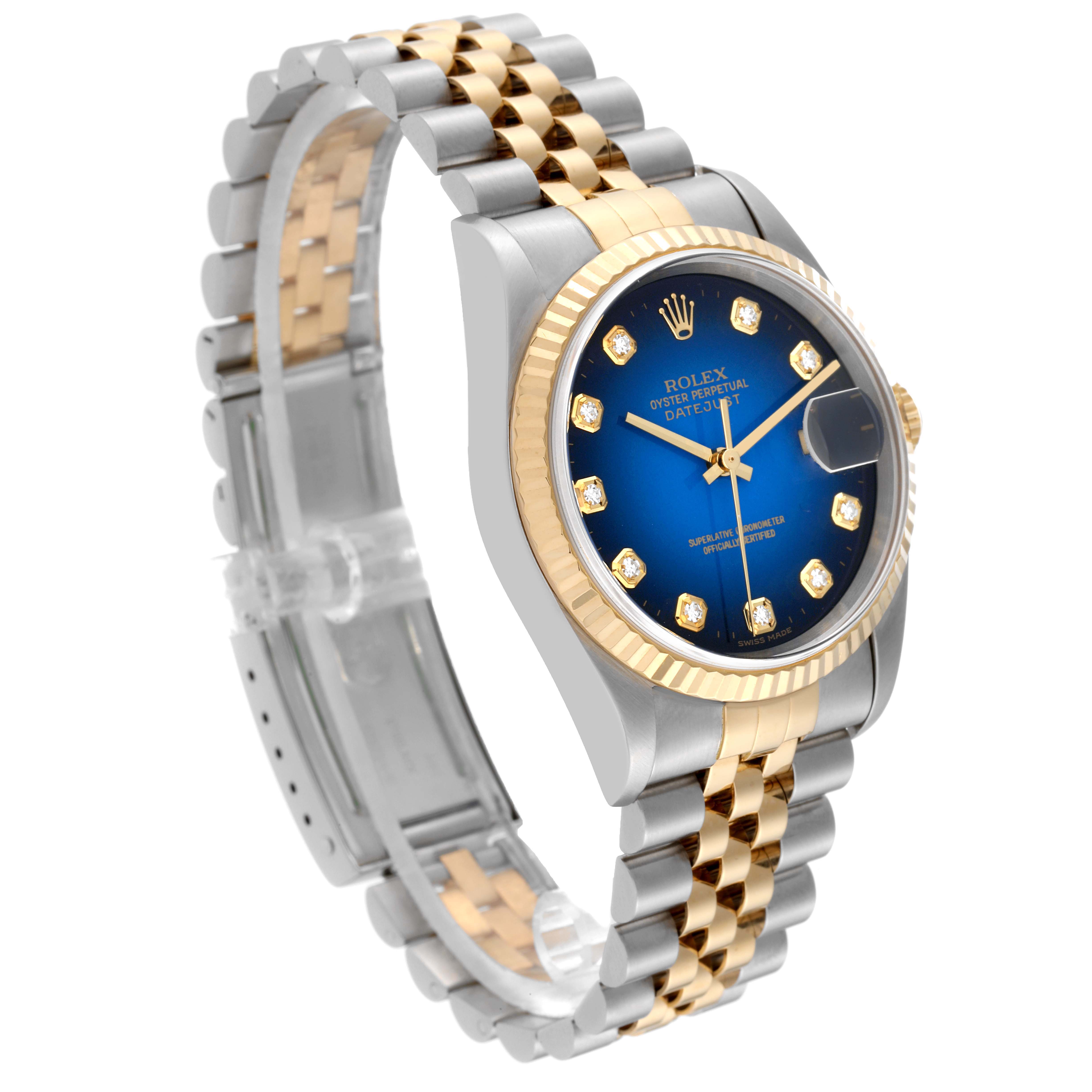 The Rolex Datejust 16233 Men's Steel and Gold (two tone) Blue Dial 16233 Men's Steel and Gold (two tone) Blue Dial watch is shown at a three-quarter angle, displaying the watch face, bezel, and bracelet.