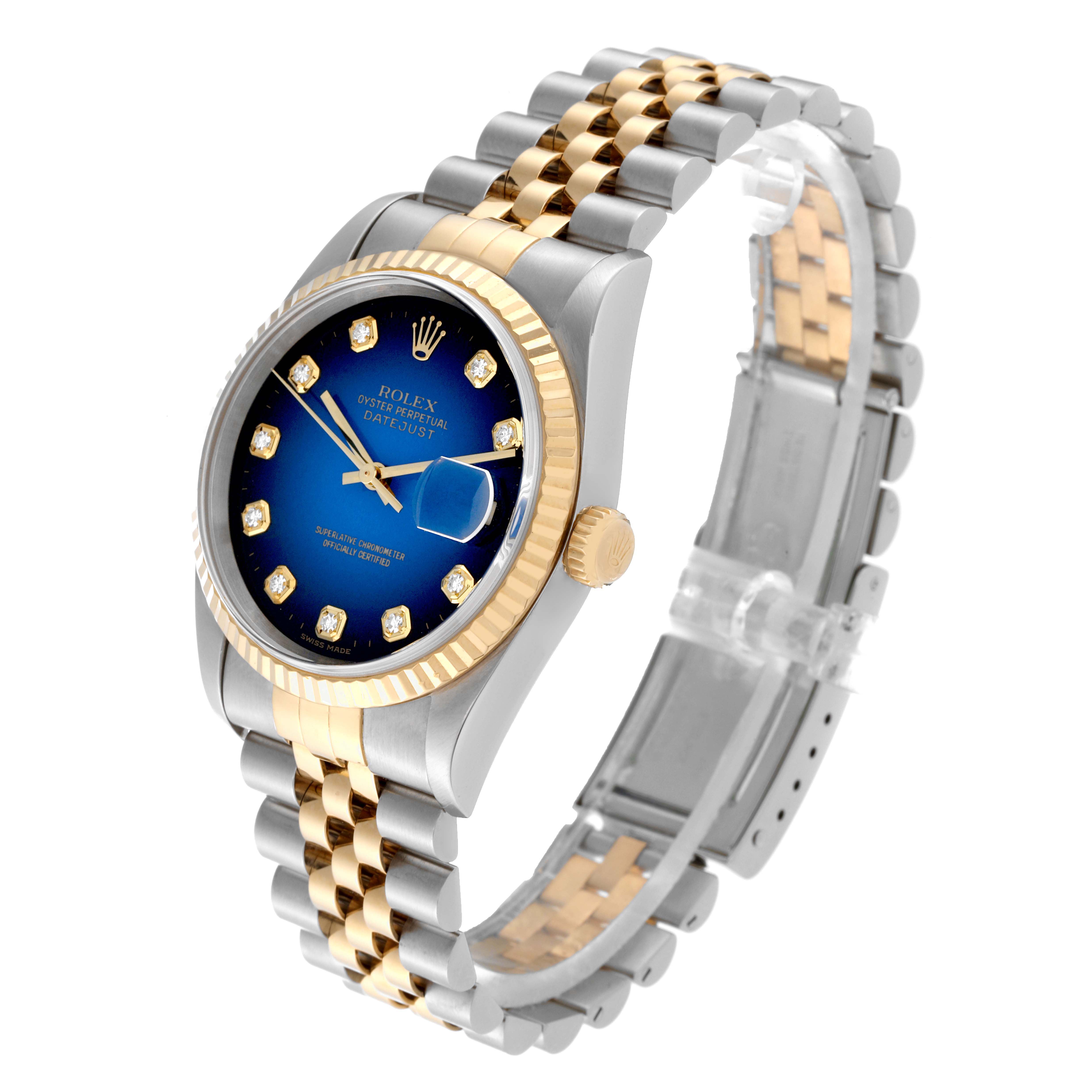 The Rolex Datejust 16233 Men's Steel and Gold (two tone) Blue Dial 16233 Men's Steel and Gold (two tone) Blue Dial watch is shown at a three-quarter angle, highlighting its blue dial, gold bezel, and two-tone bracelet.