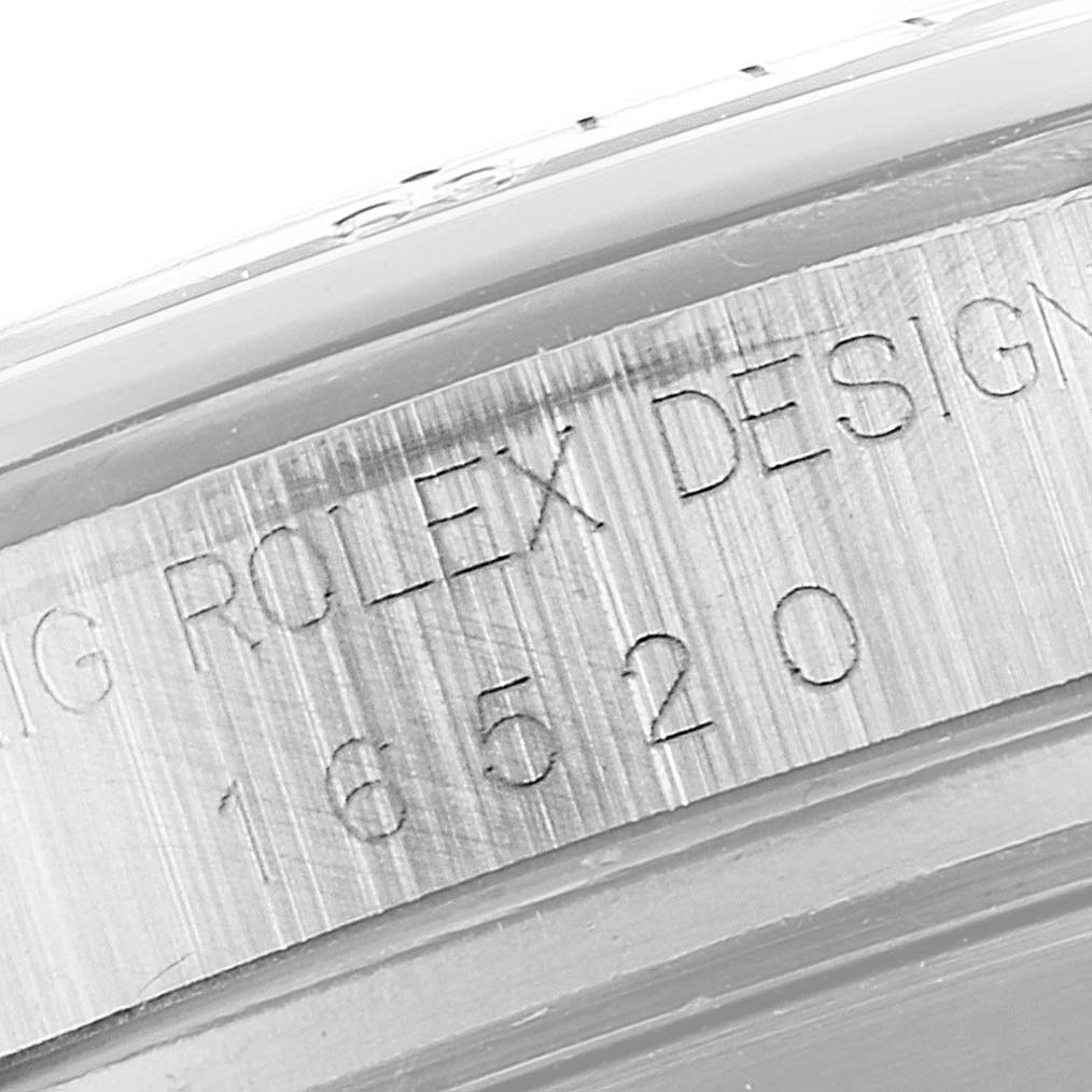 Close-up of the engraving on the case rim of a Rolex Daytona 16520 Men's Stainless Steel Black Dial 16520 Men's Stainless Steel Black Dial watch, showing the model number "16520".