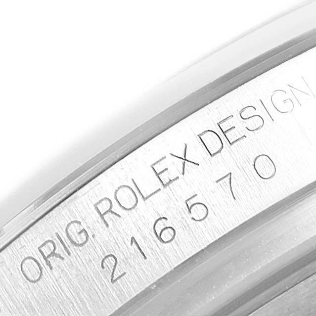 This image shows the engraved serial number on the inner case of a Rolex Explorer 216570 Men's Stainless Steel Black Dial 216570 Men's Stainless Steel Black Dial watch.