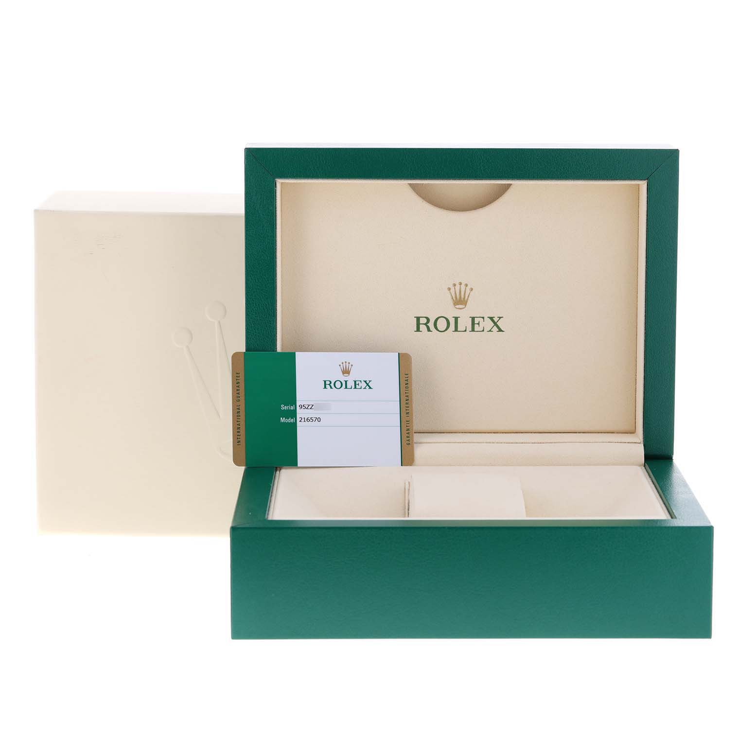The image shows the opened packaging of a Rolex Explorer 216570 Men's Stainless Steel Black Dial 216570 Men's Stainless Steel Black Dial watch, with a green box, warranty card, and an off-white inner cushion.