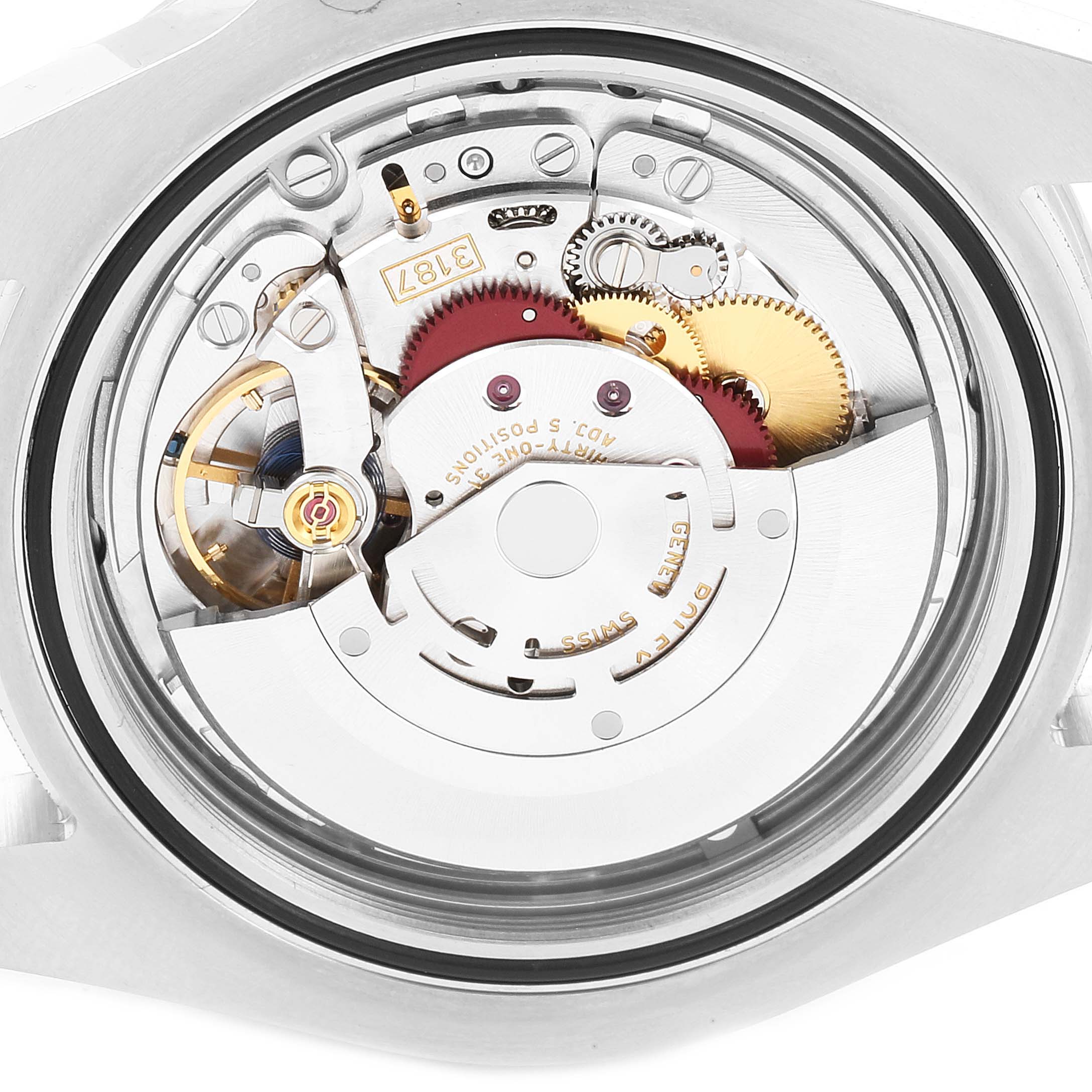 The image shows an overhead view of the internal movement components of a Rolex Explorer 216570 Men's Stainless Steel Black Dial 216570 Men's Stainless Steel Black Dial watch.