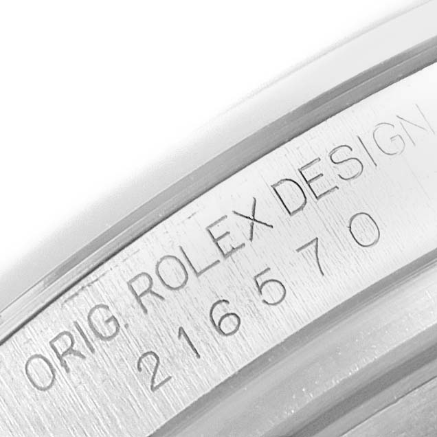 This image shows a close-up of the case side of a Rolex Explorer 216570 Men's Stainless Steel Black Dial 216570 Men's Stainless Steel Black Dial watch, highlighting the engraved model number "216570."