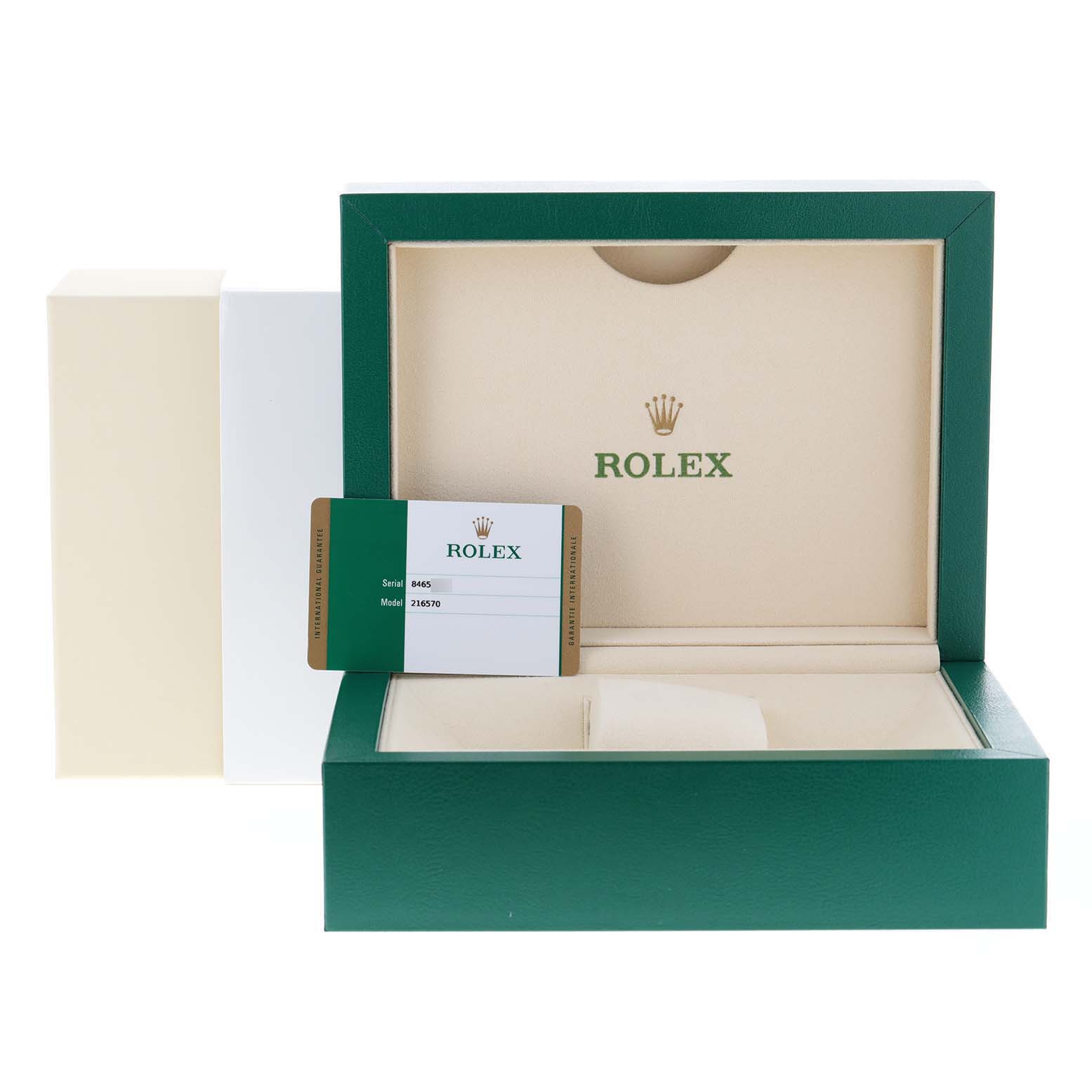 This image shows the packaging for a Rolex Explorer 216570 Men's Stainless Steel Black Dial 216570 Men's Stainless Steel Black Dial model, including the watch box, outer box, and warranty card.
