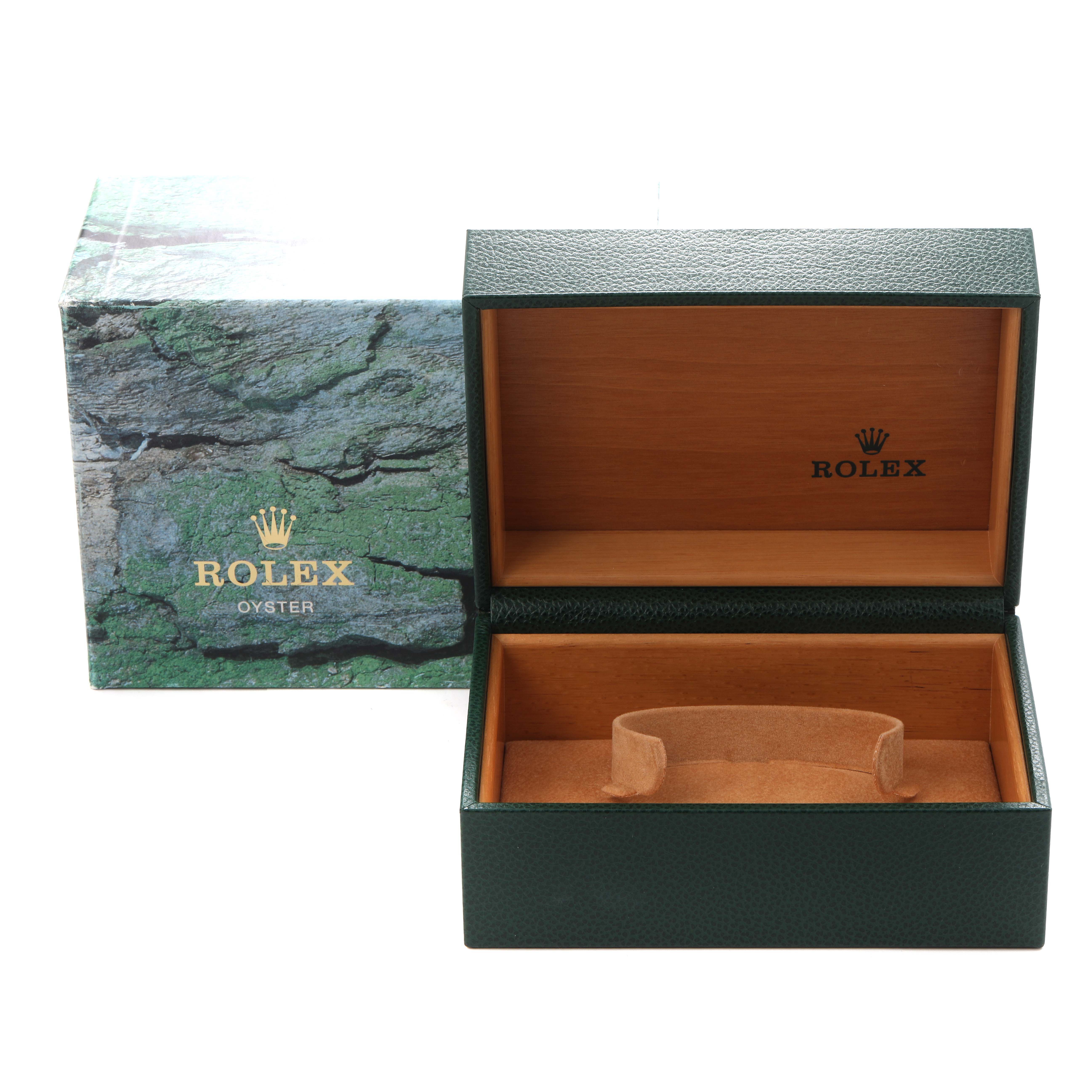 The image shows an open Rolex watch box for the GMT-Master model, with both the outer box and inner details visible.