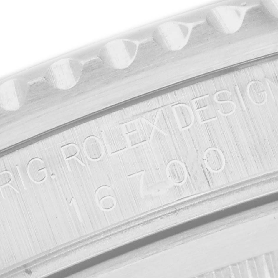 This image shows a close-up of the case side and engravings on a Rolex GMT-Master 16700 Men
s Stainless Steel Black Dial 16700 Men
s Stainless Steel Black Dial.