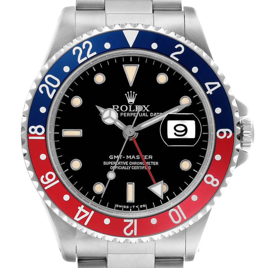 The Rolex GMT-Master watch is shown from the front, displaying the bezel, dial, hands, and bracelet top.
