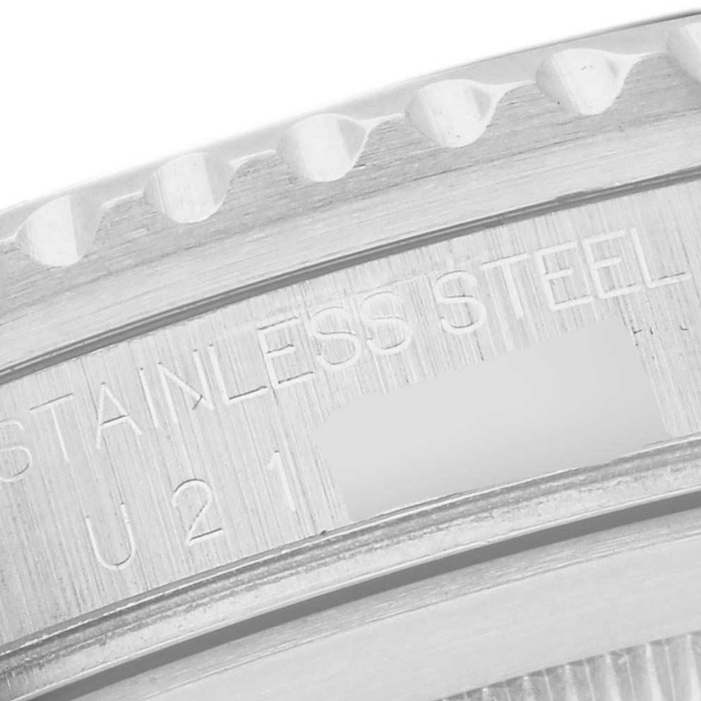 The image shows a close-up of the bezel and part of the case side of a Rolex GMT-Master 16700 Men
s Stainless Steel Black Dial 16700 Men
s Stainless Steel Black Dial watch.