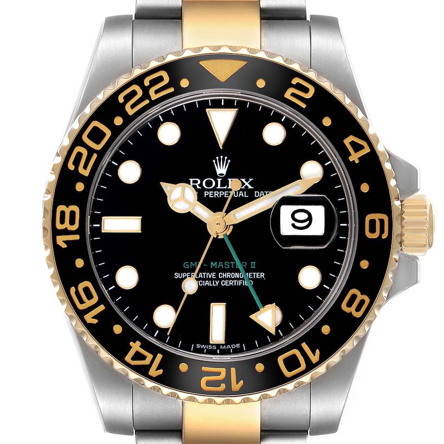 The Rolex GMT-Master watch is shown from a top view, highlighting the bezel, dial, hands, crown, and bracelet.