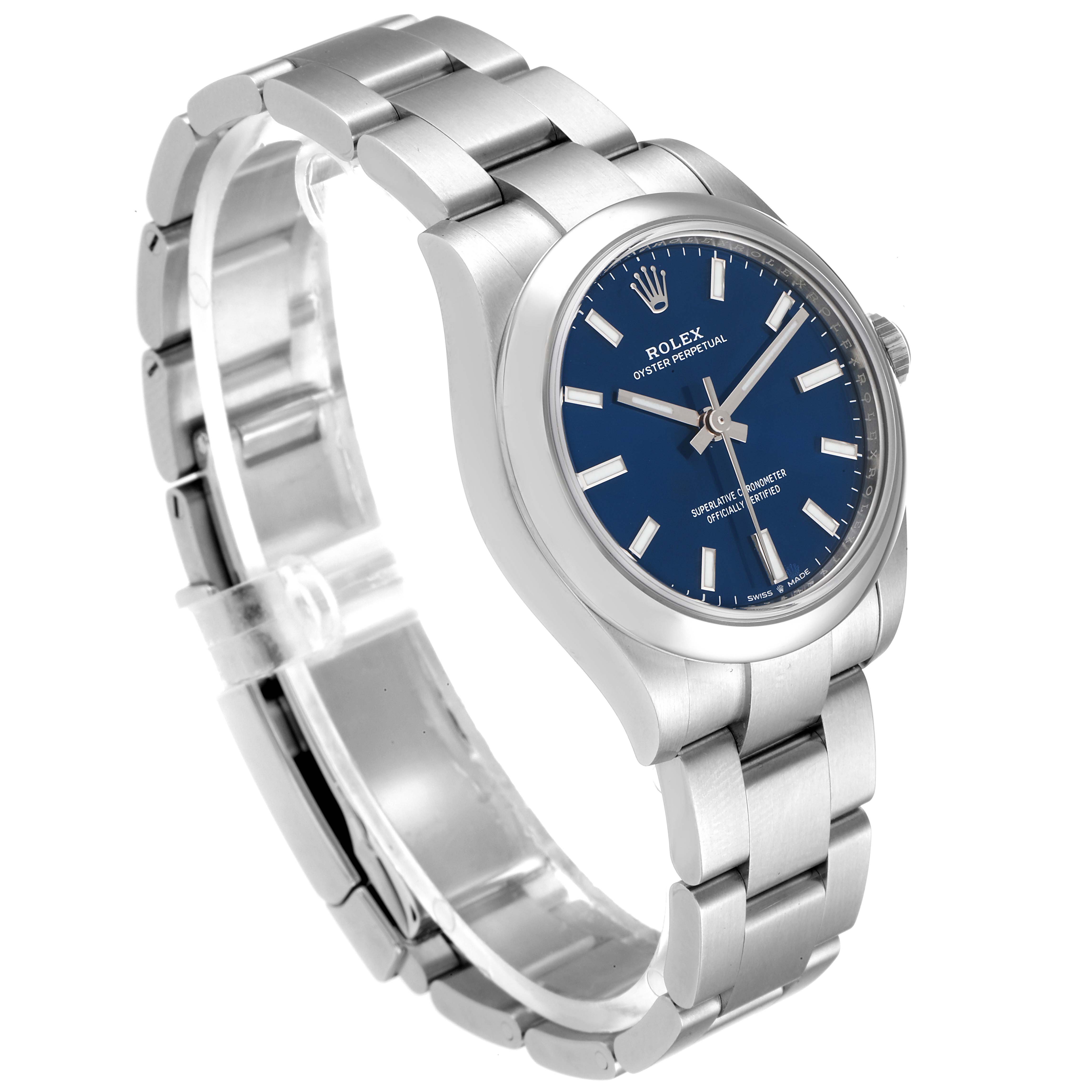 This image shows a Rolex Mid-Size 277200 Women
s Stainless Steel Blue Dial 277200 Women
s Stainless Steel Blue Dial watch at a three-quarter angle, highlighting the blue dial, silver hands, and metallic bracelet.