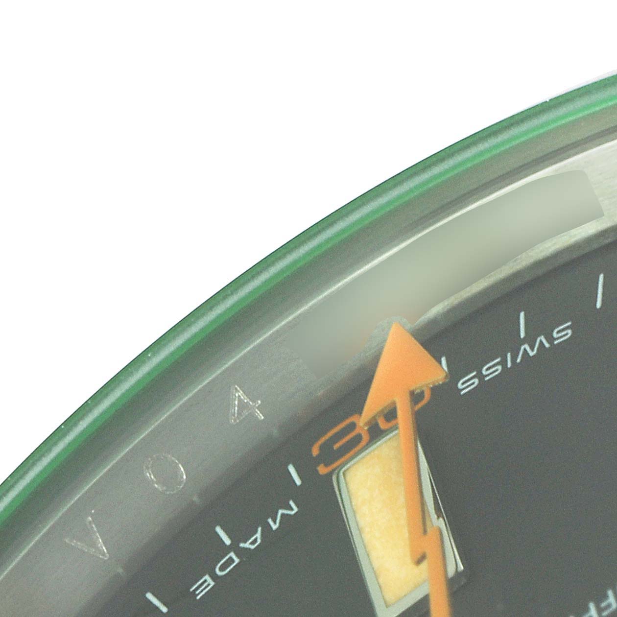 This close-up shows the dial of a Rolex Milgauss 116400V Men's Stainless Steel Black Dial 116400V Men's Stainless Steel Black Dial watch with orange markers and the green-tinted glass.