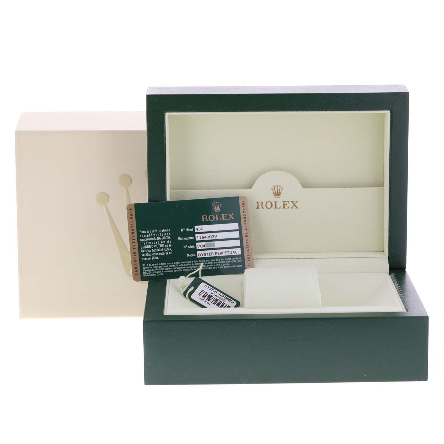 The image shows a Rolex Milgauss 116400V Men's Stainless Steel Black Dial 116400V Men's Stainless Steel Black Dial watch box with documentation and a tag, viewed from the front.