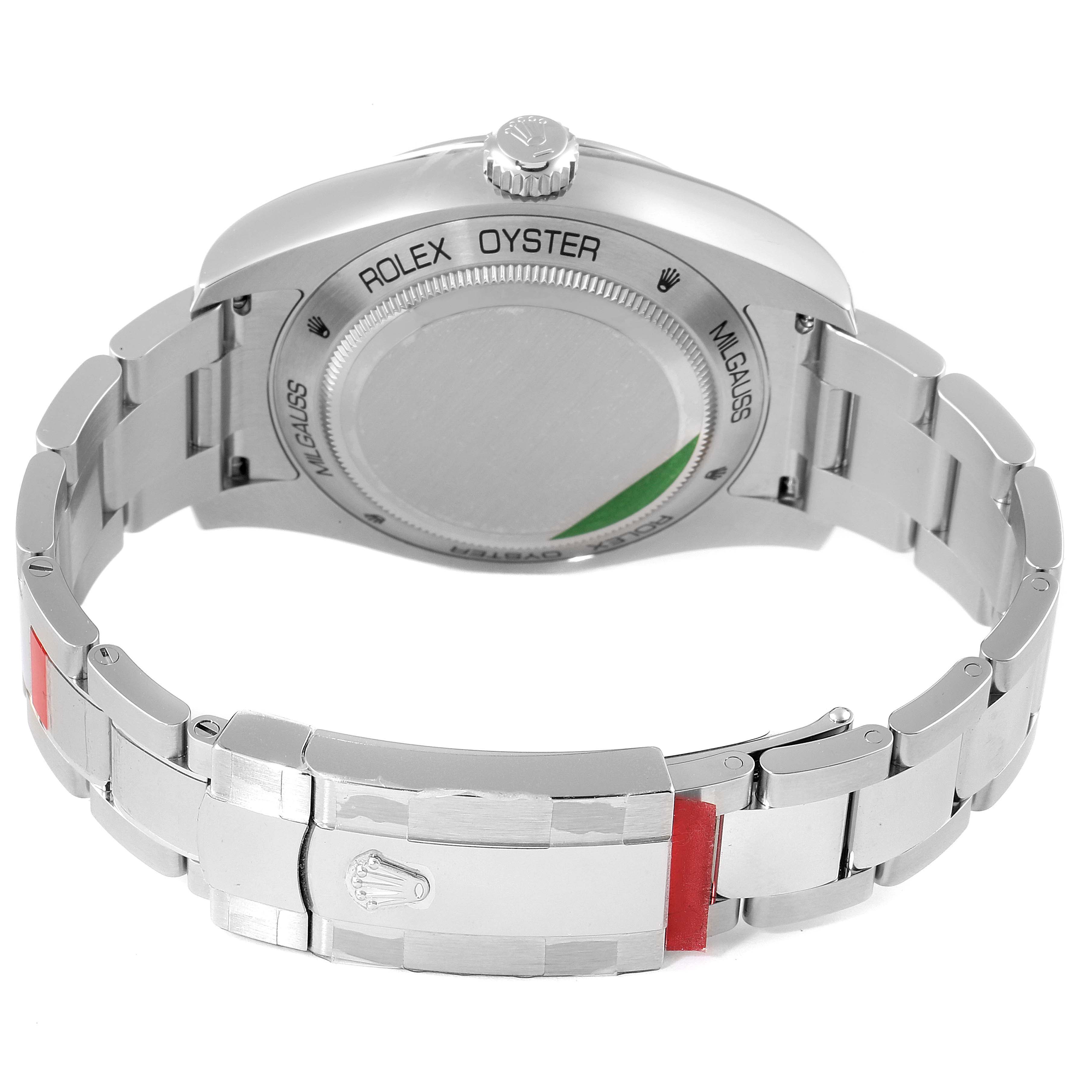 The image shows the back view of a Rolex Milgauss 116400GV Men
s Stainless Steel Blue Dial 116400GV Men
s Stainless Steel Blue Dial watch, highlighting the case back and metal bracelet with clasp.