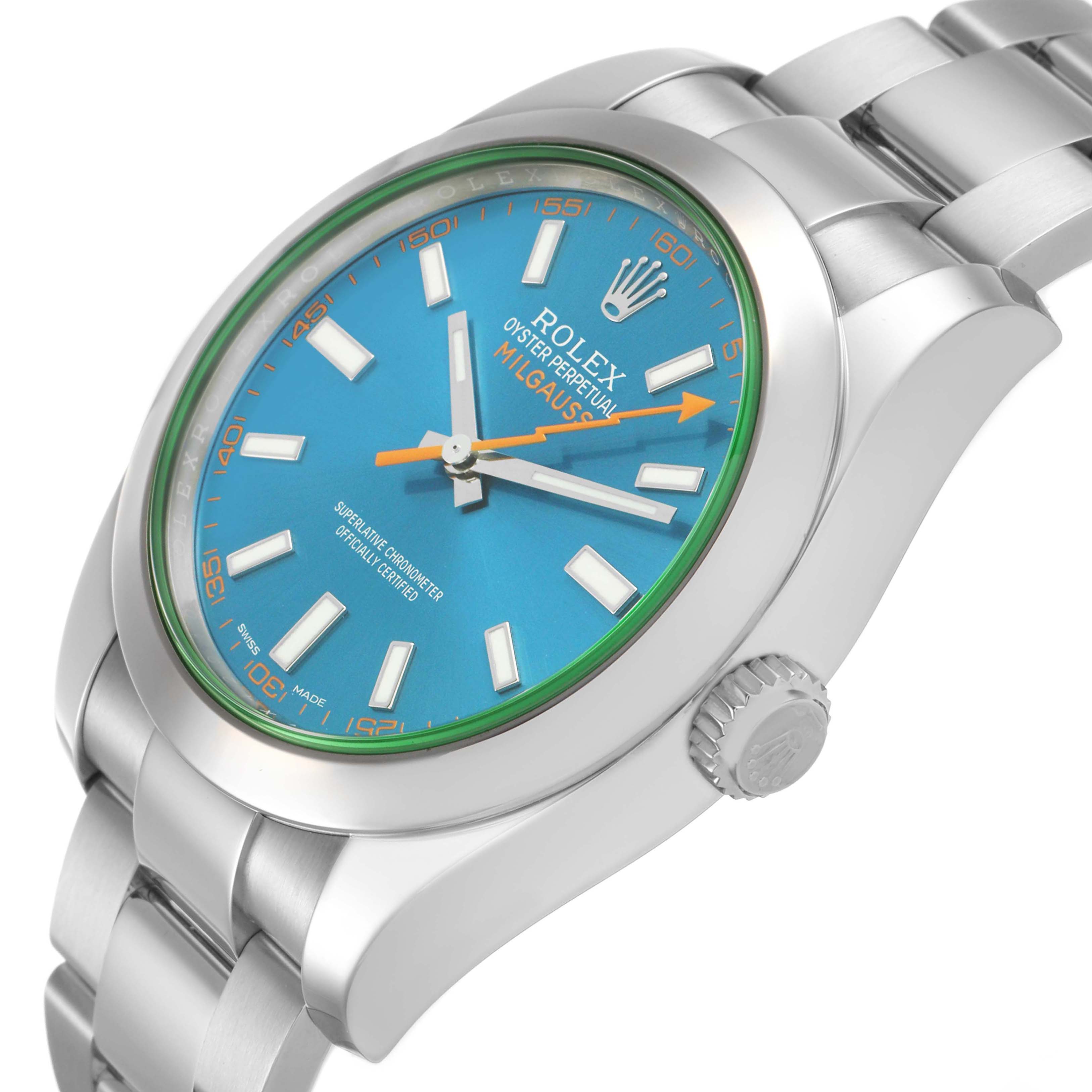 The Rolex Milgauss M116400GV Men's Stainless Steel Blue Dial watch is shown at a tilted angle, highlighting the blue dial, orange second hand, bezel, and part of the bracelet.