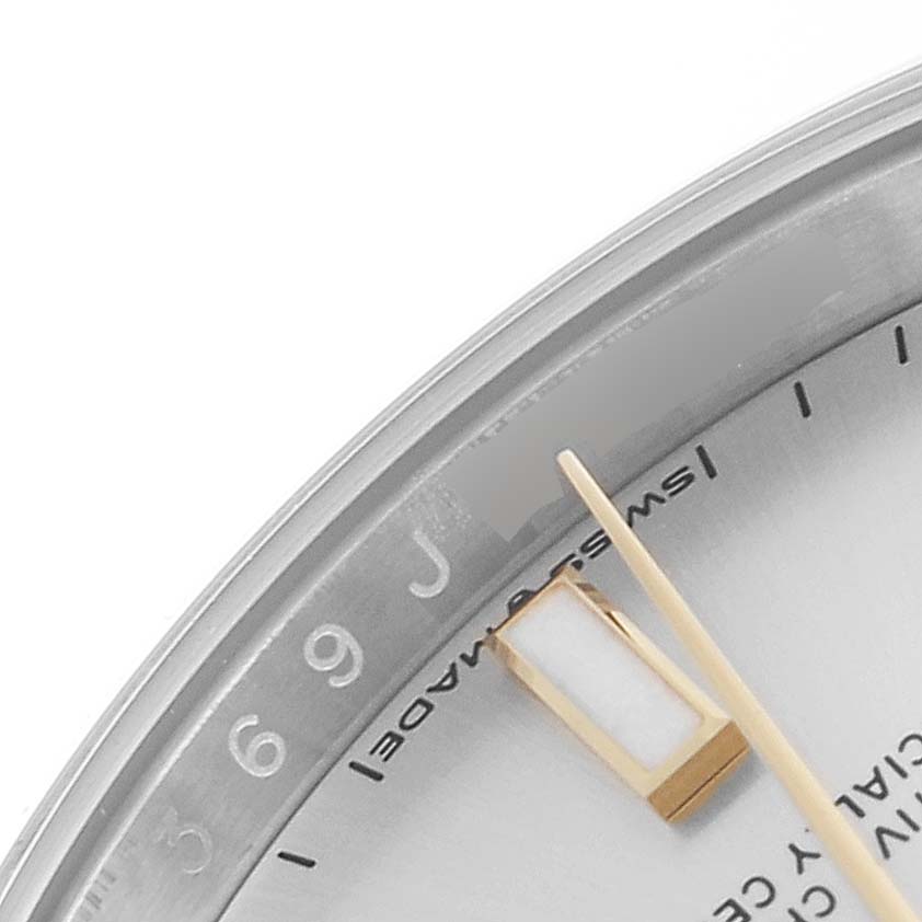 The image shows a close-up of the dial, bezel, and hour hand of a Rolex Oyster Perpetual 124200 Men
s Stainless Steel Silver Dial 124200 Men
s Stainless Steel Silver Dial watch.