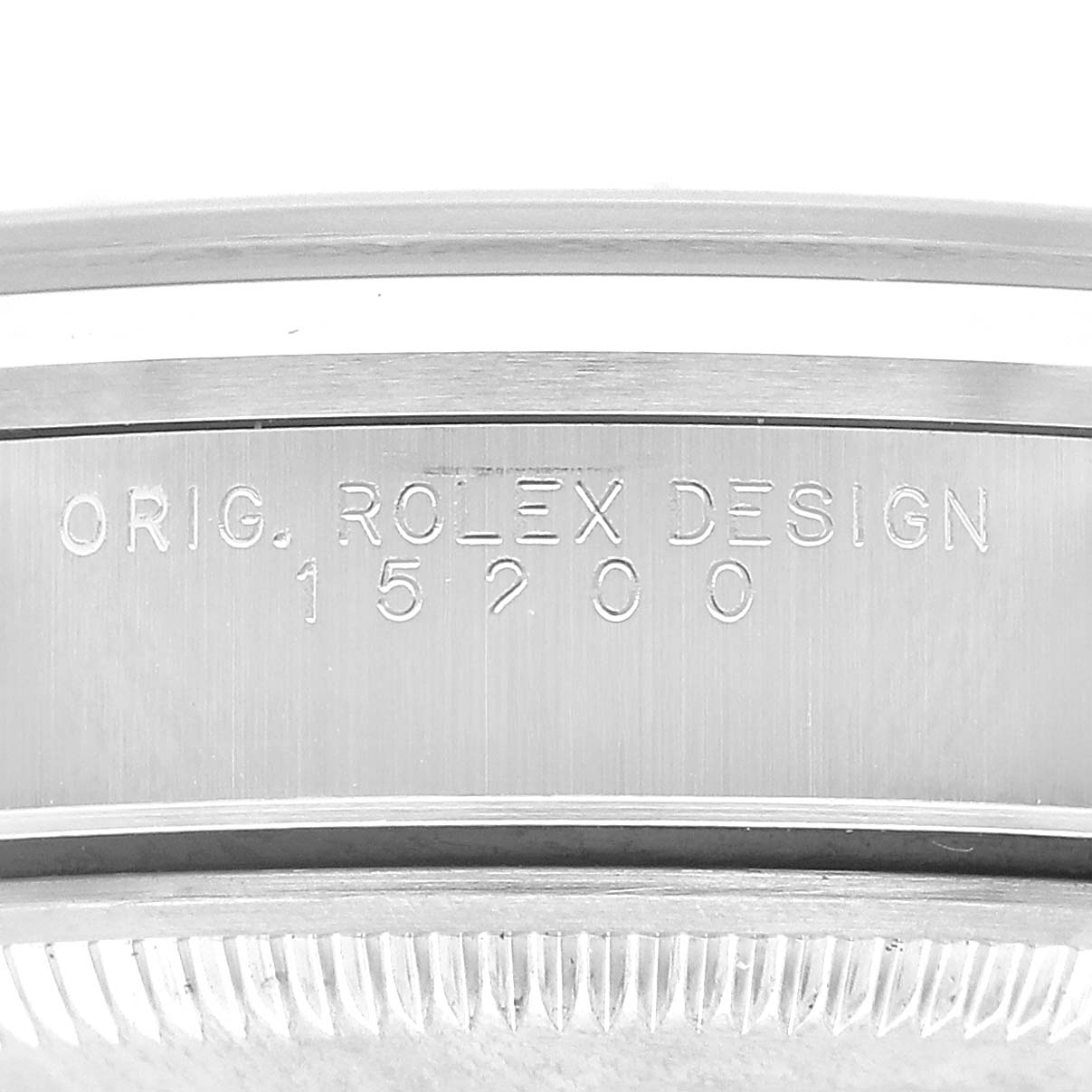 The image shows a close-up of the side view of the Rolex Oyster Perpetual 15200 Men's Stainless Steel Black Dial model’s case with engravings visible.