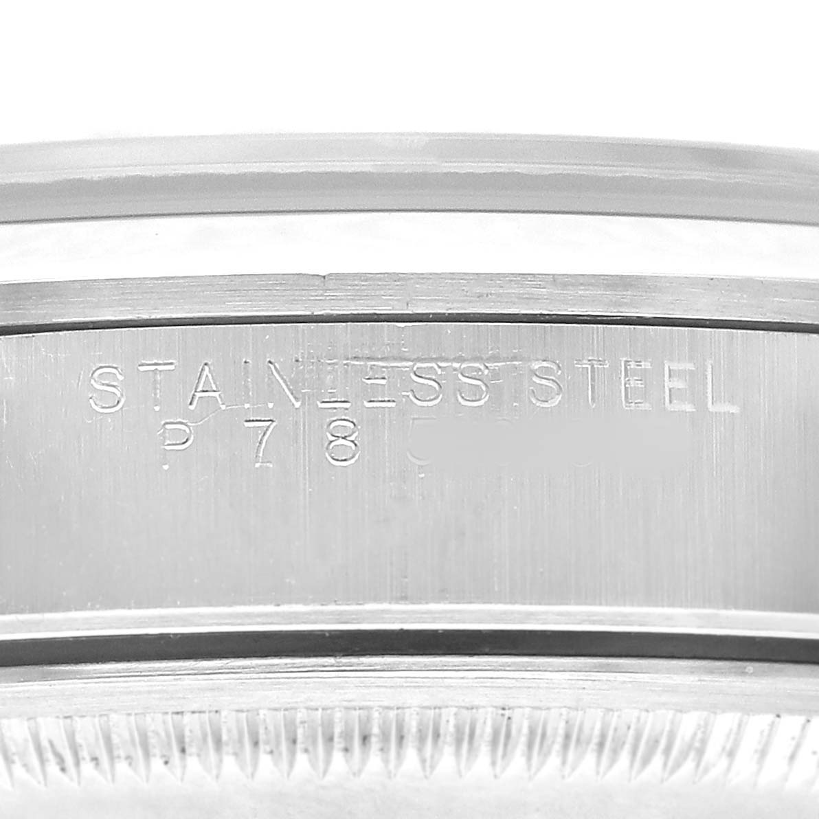 The image shows a close-up of the case side engraving and bezel of a Rolex Oyster Perpetual 15200 Men's Stainless Steel Black Dial watch.