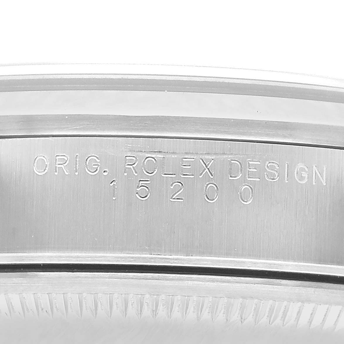 The image shows the side of a Rolex Date 15200 Men's Stainless Steel Black Dial model, featuring engraved text on the case.