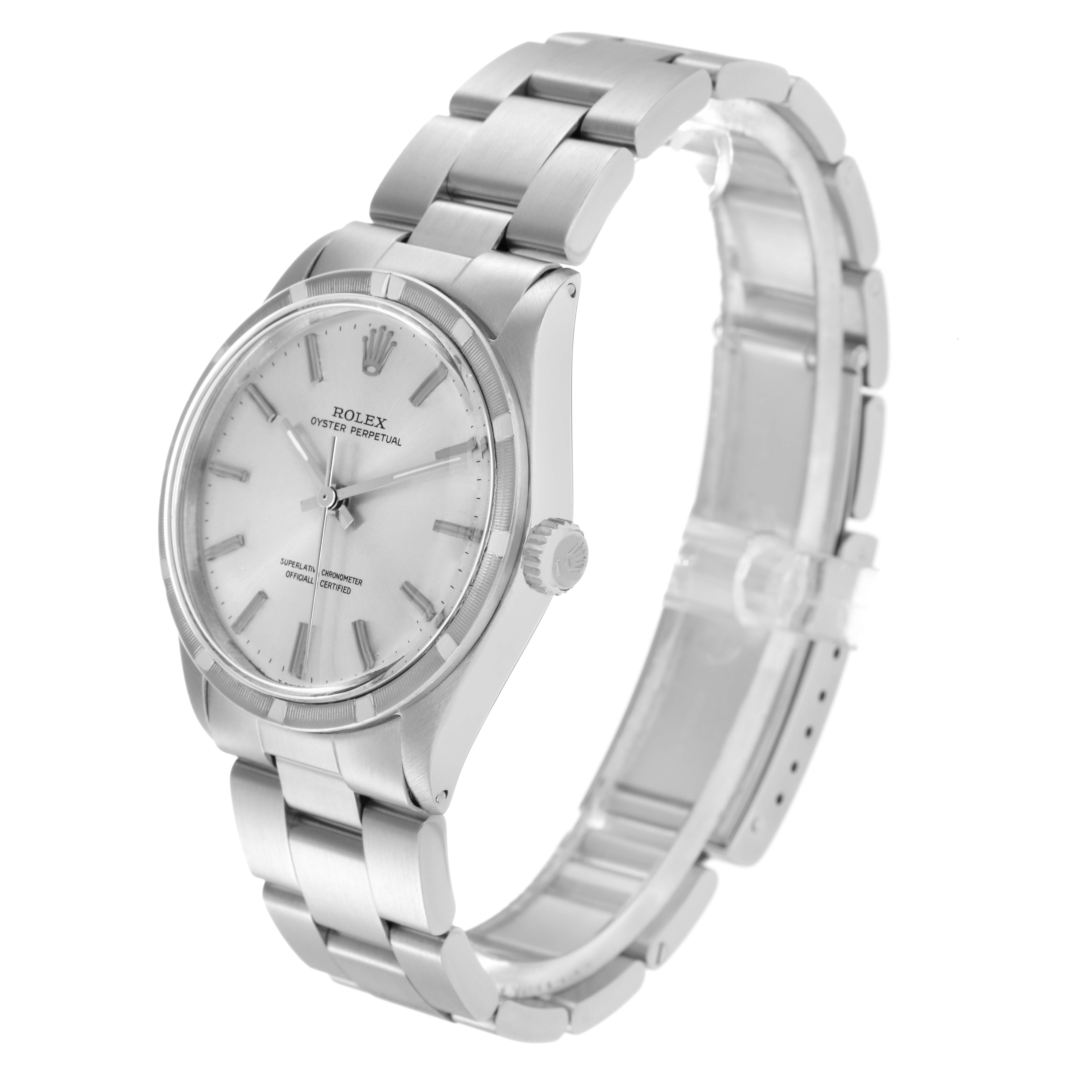 The image shows a Rolex Oyster Perpetual 1007 Men
s Stainless Steel Silver Dial 1007 Men
s Stainless Steel Silver Dial watch at a three-quarter angle, highlighting the face, bezel, crown, and bracelet.