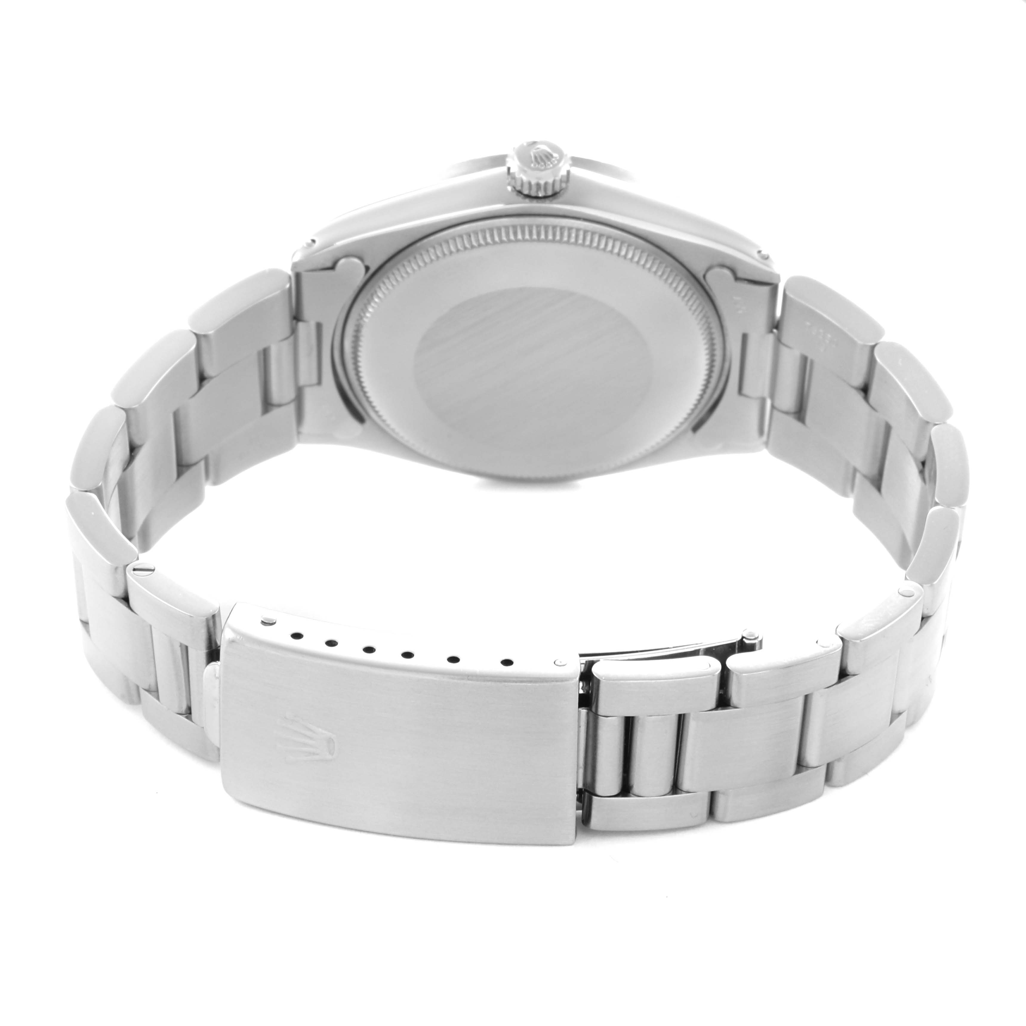 The image shows the back of a Rolex Oyster Perpetual 1007 Men
s Stainless Steel Silver Dial 1007 Men
s Stainless Steel Silver Dial watch, highlighting the clasp, bracelet, and case back.