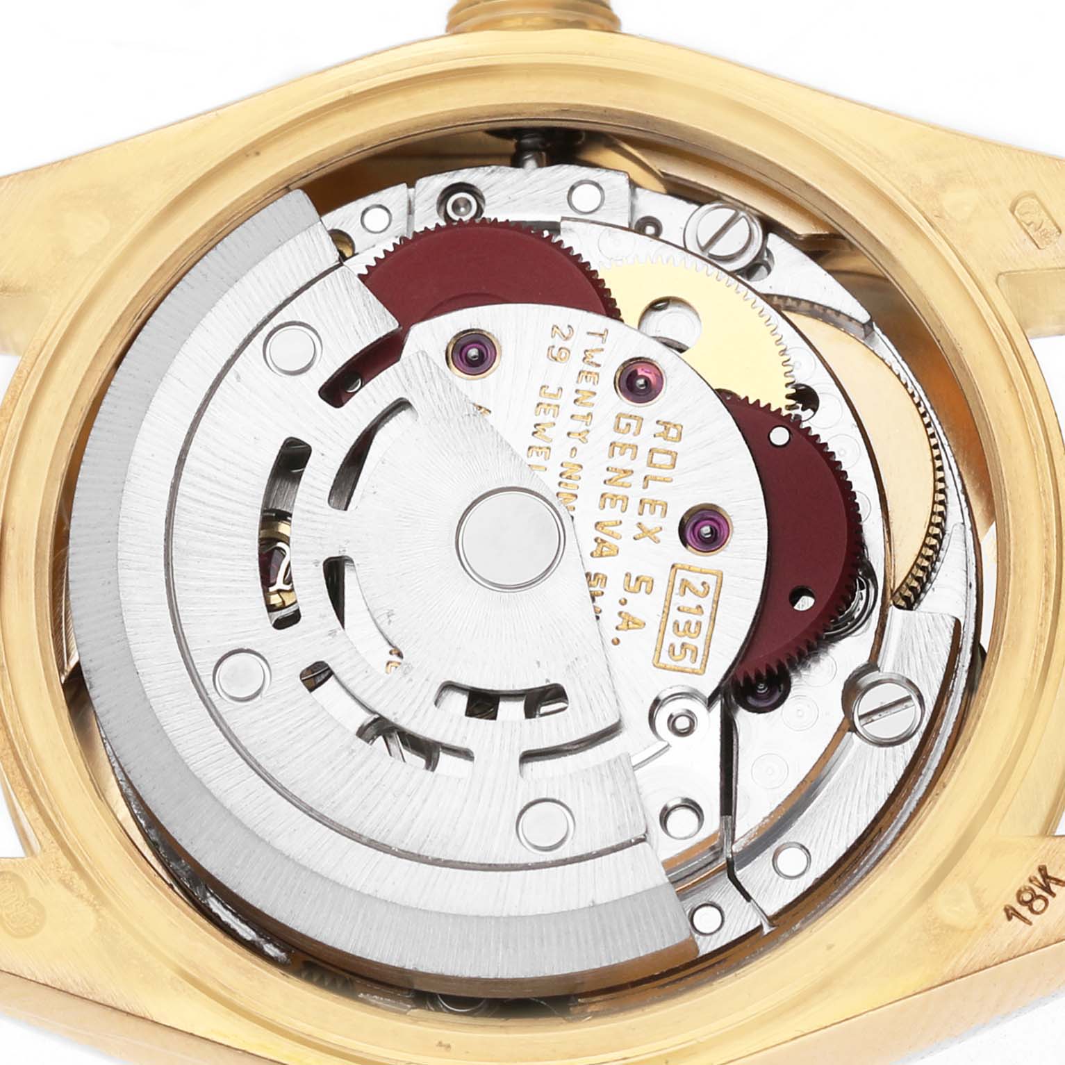 The image shows the movement of a Rolex President 69178 Women's Yellow Gold Champagne Dial watch from a top-down angle, highlighting the intricate gears and components.