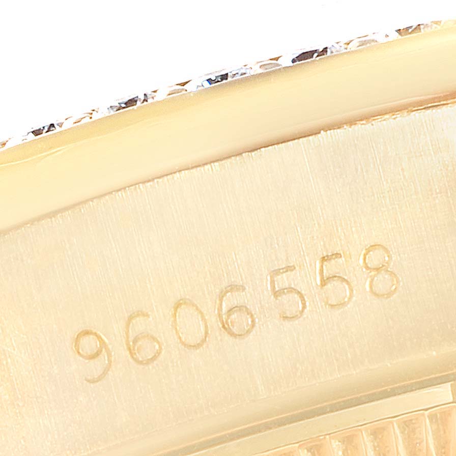 This close-up image shows the serial number engraved on the side of the case for a Rolex President 69138 Women
s Yellow Gold Champagne Dial 69138 Women
s Yellow Gold Champagne Dial model watch.