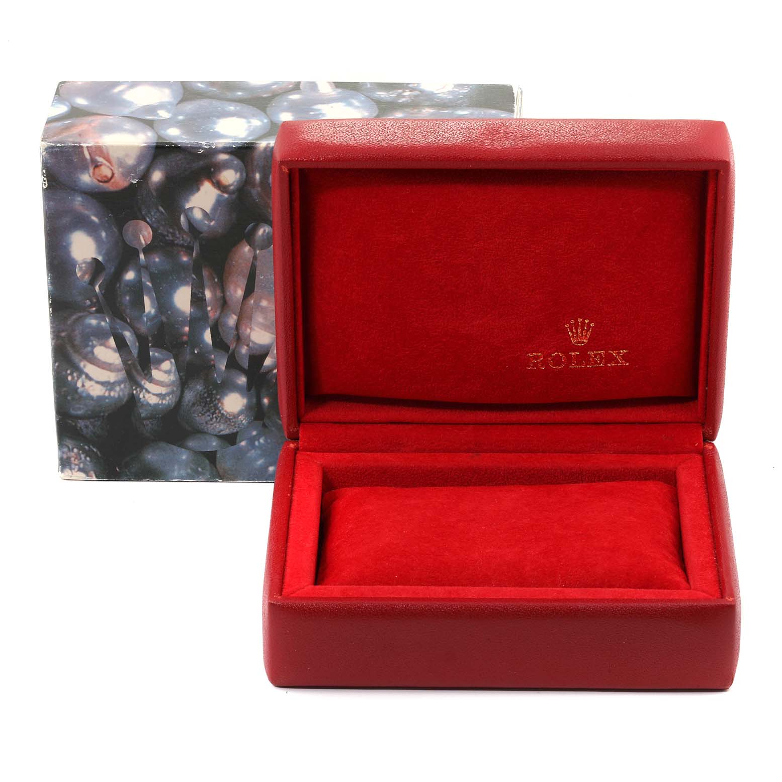 The image shows an open red Rolex watch box for the President model, with the outer packaging in the background.