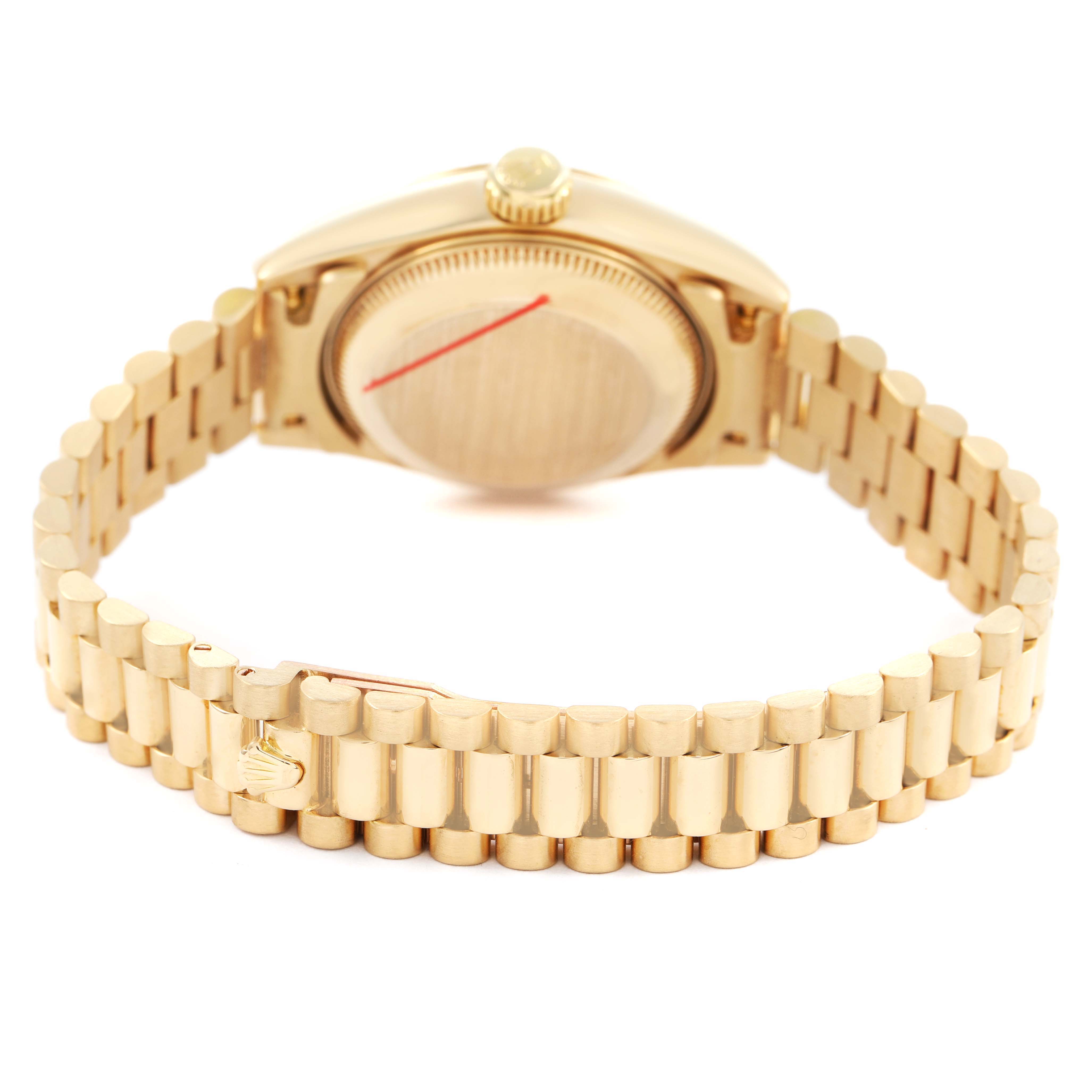 The image shows a Rolex President 69178 Women's Yellow Gold Champagne Dial watch from the back, highlighting the case back, crown, and band.