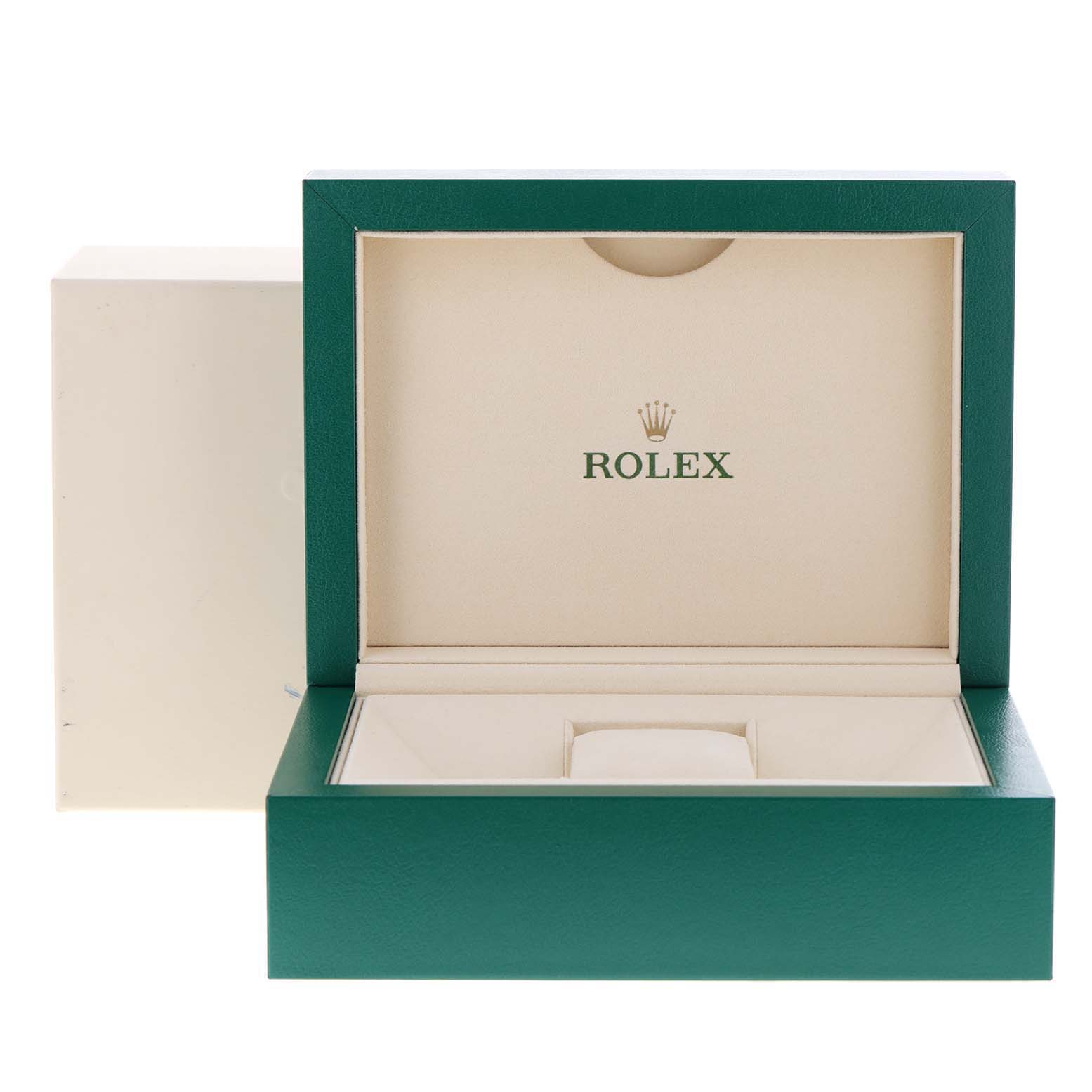 The image shows an open Rolex President 118239 Men's White Gold Brown Dial 118239 Men's White Gold Brown Dial watch box with a green exterior and beige interior.
