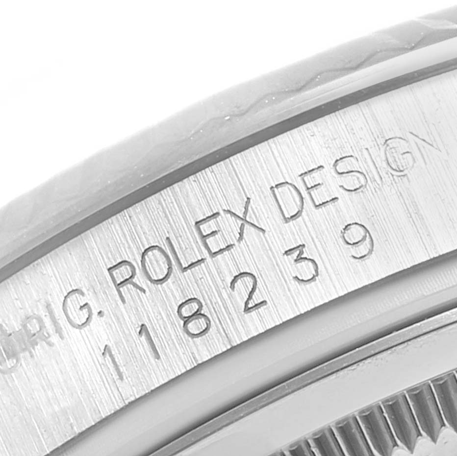 This close-up image shows the side engraving with model number on a Rolex President 118239 Men's White Gold Brown Dial 118239 Men's White Gold Brown Dial watch.