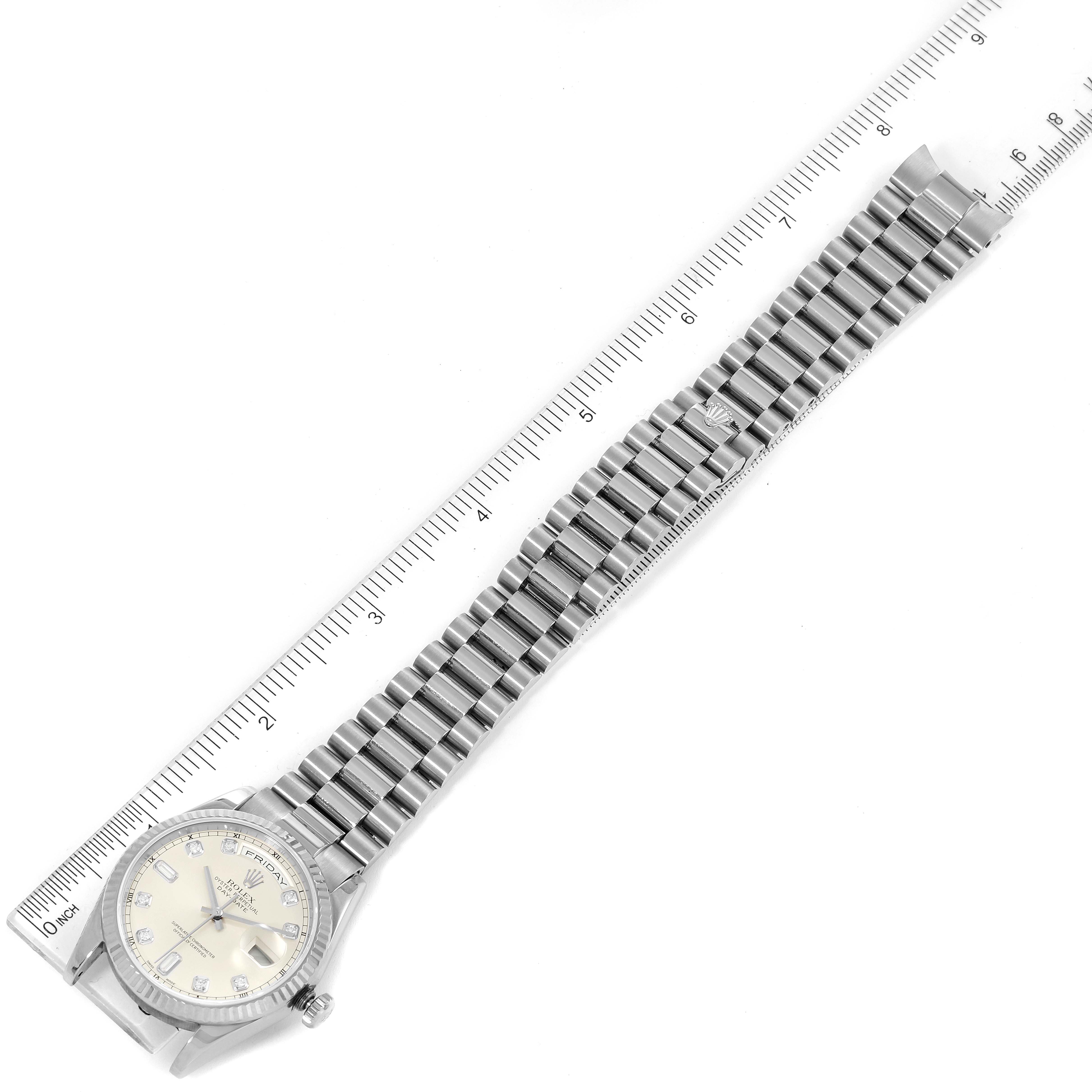 The image shows a Rolex President 118239 Men's White Gold Silver Dial 118239 Men's White Gold Silver Dial model watch lying flat with a ruler, displaying the face and full length of the band.
