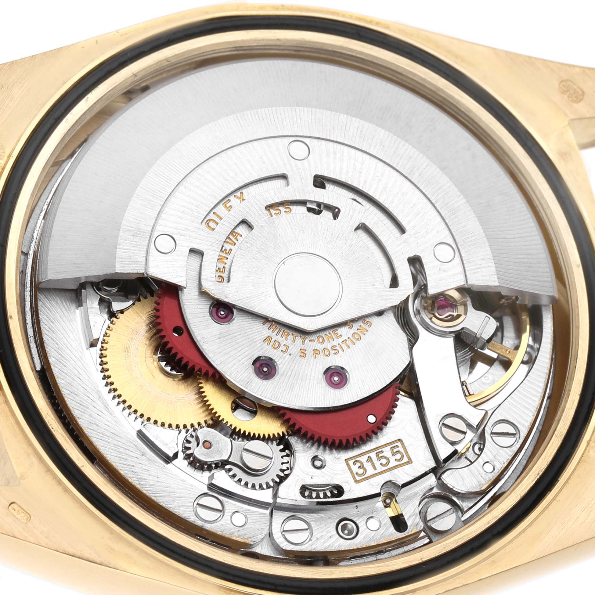 The image shows the movement and inner mechanism of a Rolex President 18238 Men's Yellow Gold Champagne Dial watch, highlighting gears and rotor.