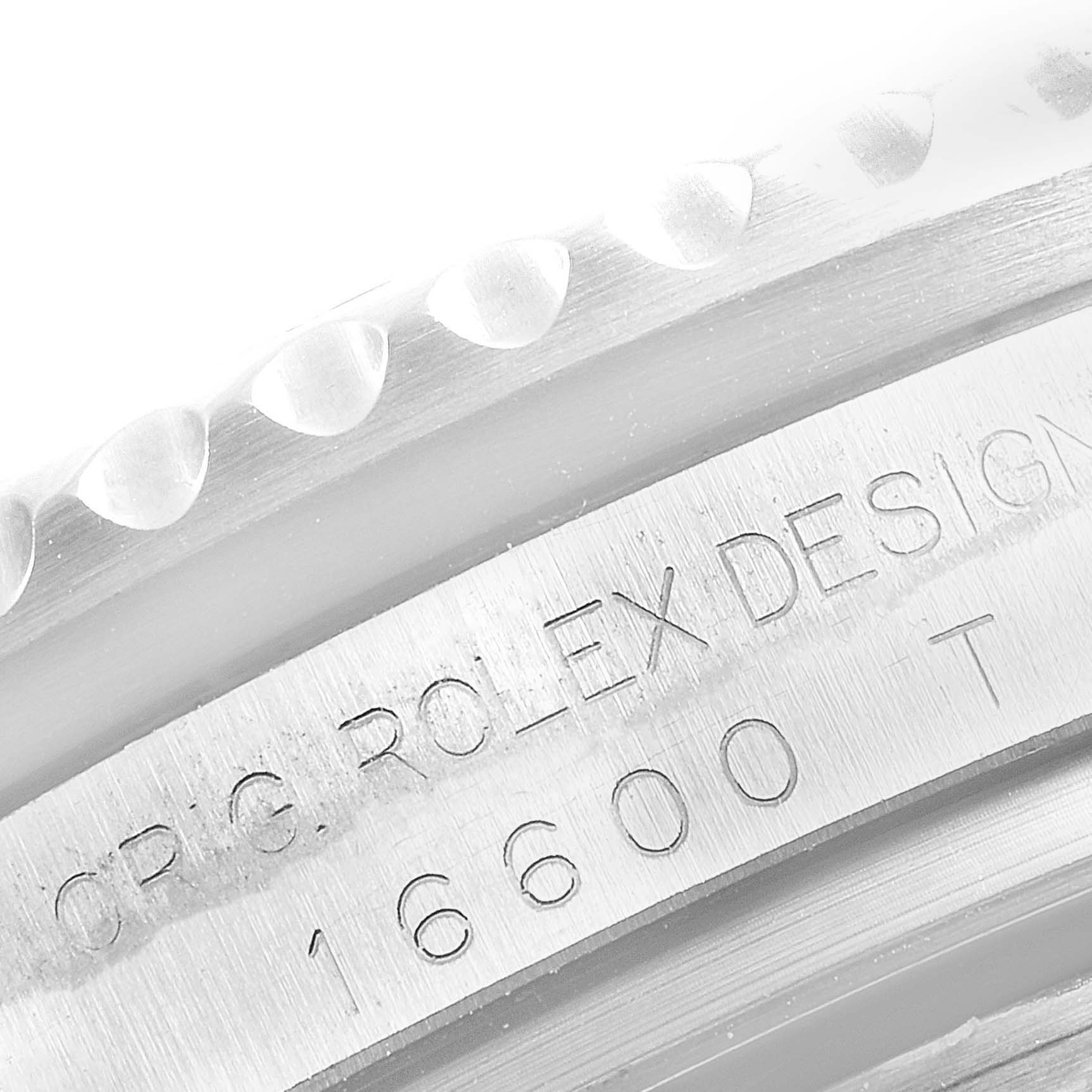 This close-up image of the Rolex Sea-Dweller 16600 Men
s Stainless Steel Black Dial 16600 Men
s Stainless Steel Black Dial watch shows the engraved model number "16600" on the case.