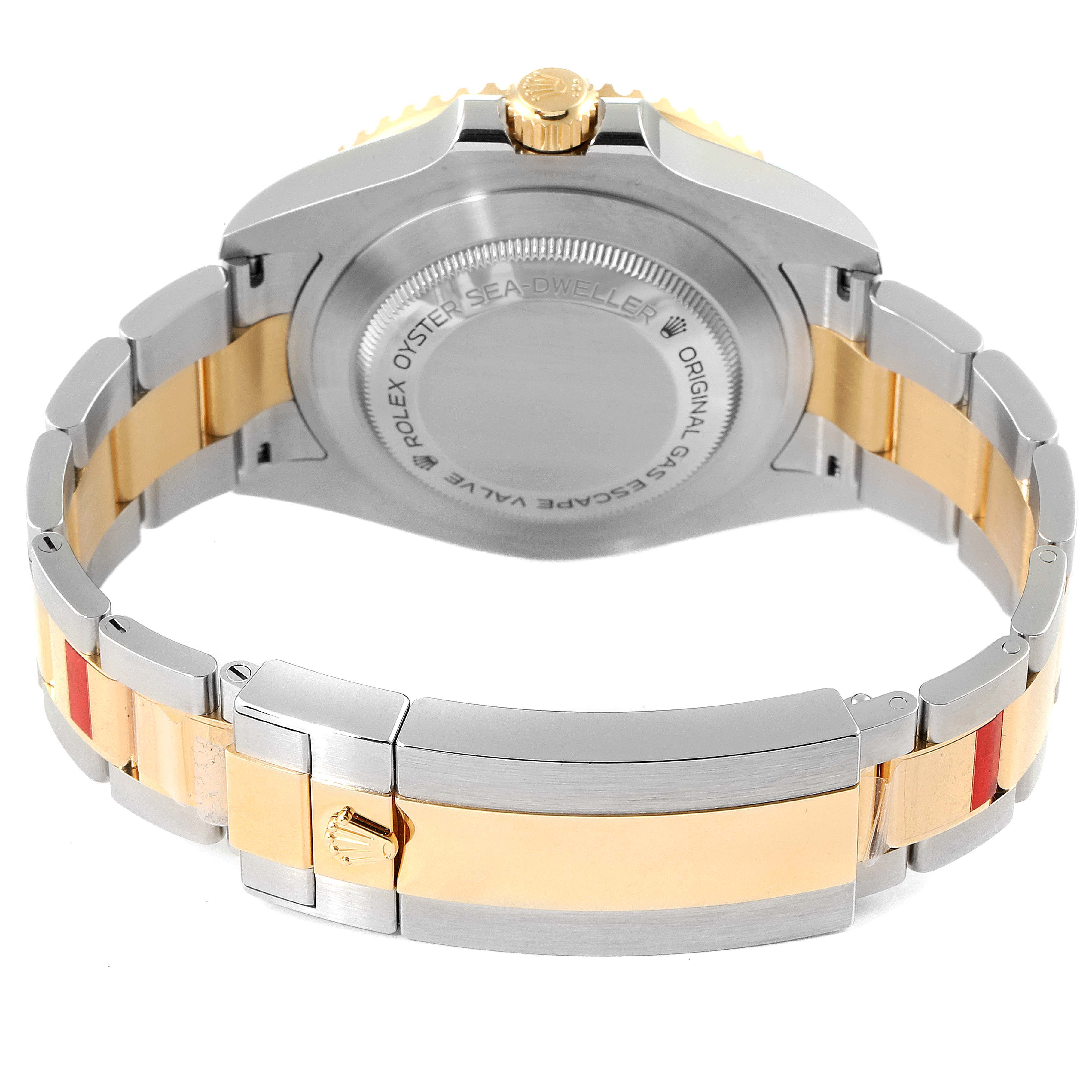 This image shows the back case and bracelet of the Rolex Sea-Dweller 126603 Men's Steel and Gold (two tone) Black Dial 126603 Men's Steel and Gold (two tone) Black Dial watch, highlighting its two-tone design.