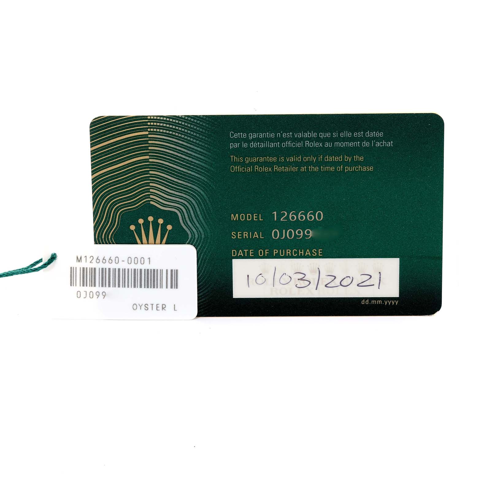 The image shows the warranty card and tag for the Rolex Sea-Dweller 126660 Men
s Stainless Steel Black Dial 126660 Men
s Stainless Steel Black Dial model 126660.