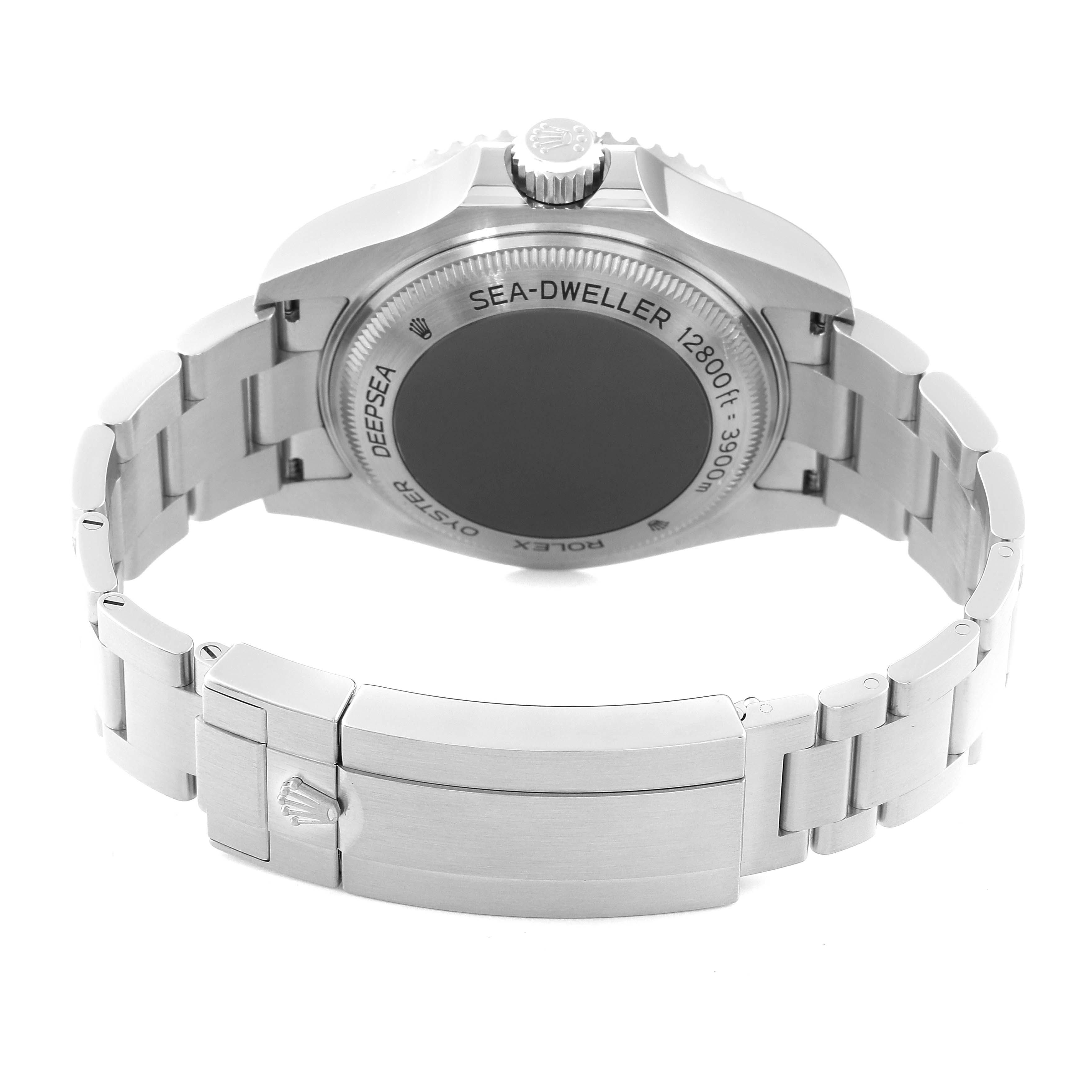 The image shows the back and bracelet clasp of a Rolex Sea-Dweller 126660 Men
s Stainless Steel Black Dial 126660 Men
s Stainless Steel Black Dial watch, highlighting the case back engraving and metal bracelet.