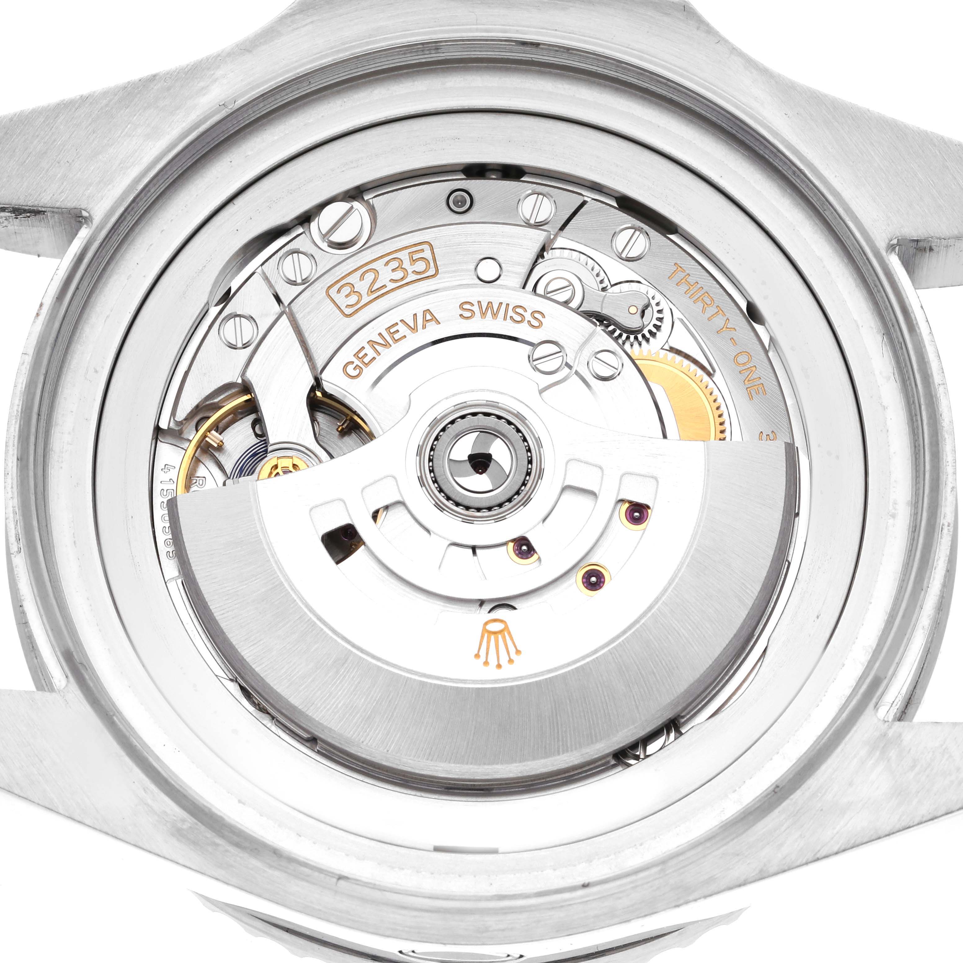 The image is a close-up view of the movement and intricate internal mechanics of the Rolex Sea-Dweller 126660 Men
s Stainless Steel Black Dial 126660 Men
s Stainless Steel Black Dial model 3235.