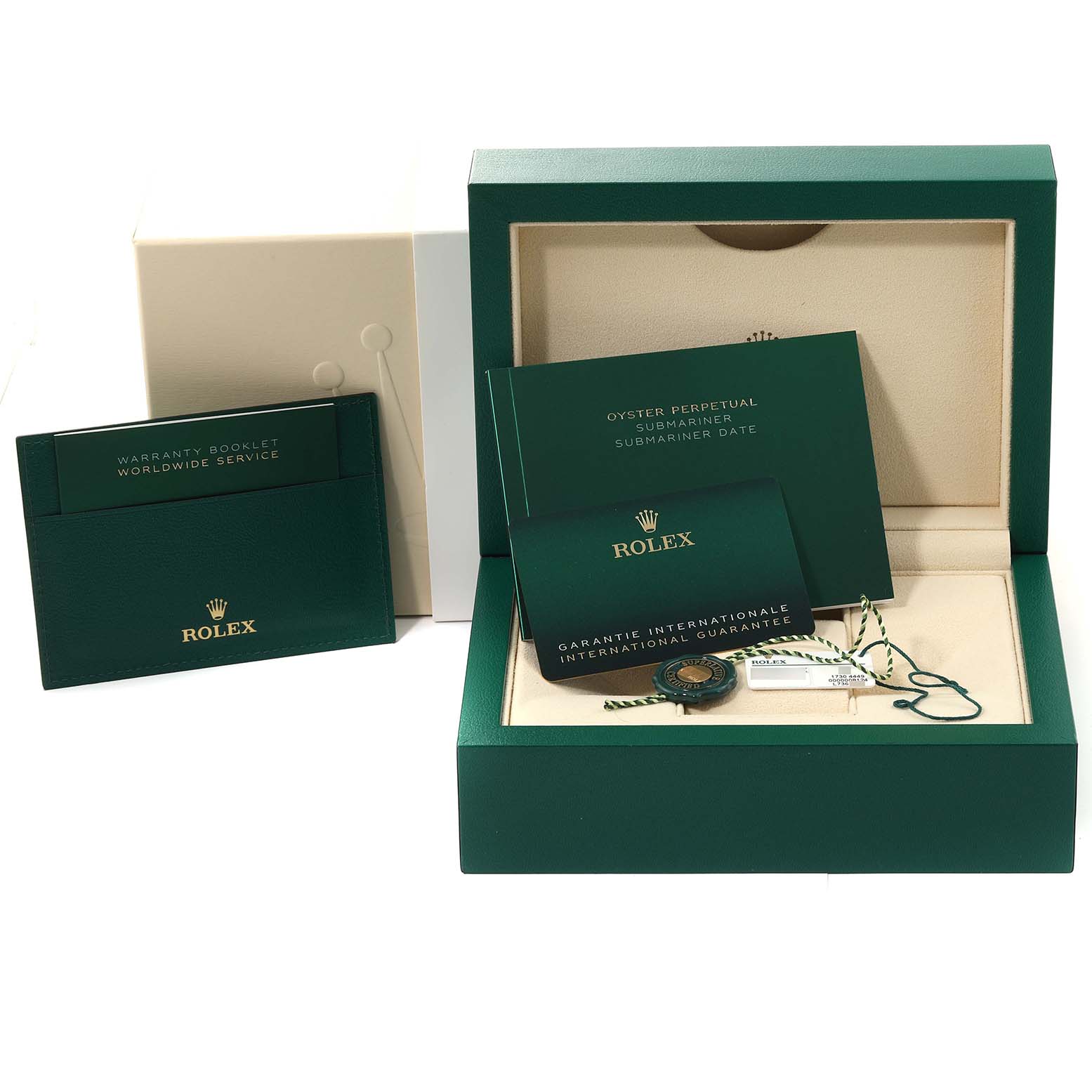 The image shows the packaging and accessories for a Rolex Submariner 126613 Men's Steel and Gold (two tone) Blue Dial 126613 Men's Steel and Gold (two tone) Blue Dial model, including booklets, warranty cards, tags, and the box.
