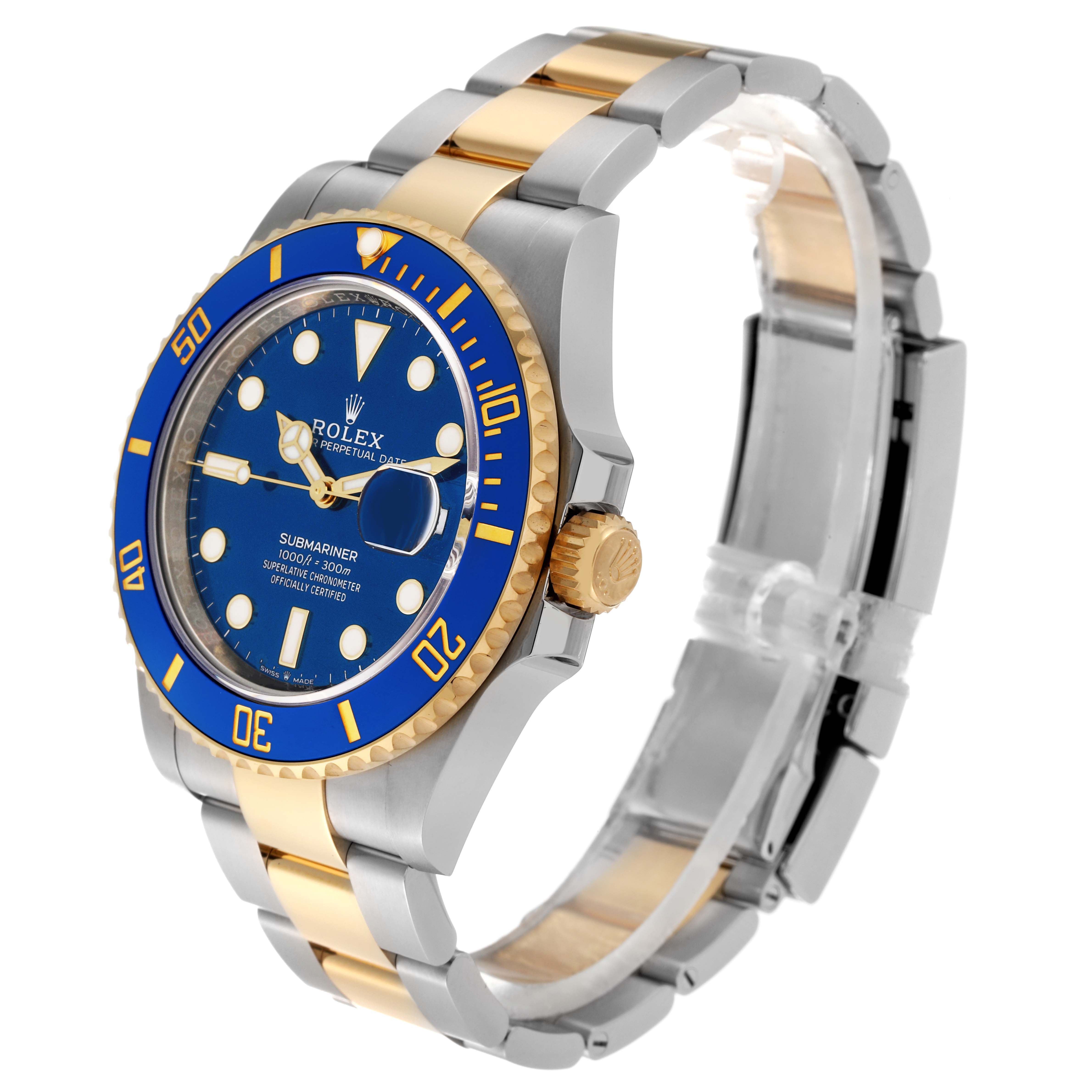 This image shows a side angle of the Rolex Submariner 126613 Men's Steel and Gold (two tone) Blue Dial 126613 Men's Steel and Gold (two tone) Blue Dial watch, highlighting its blue bezel, gold accents, and the bracelet.
