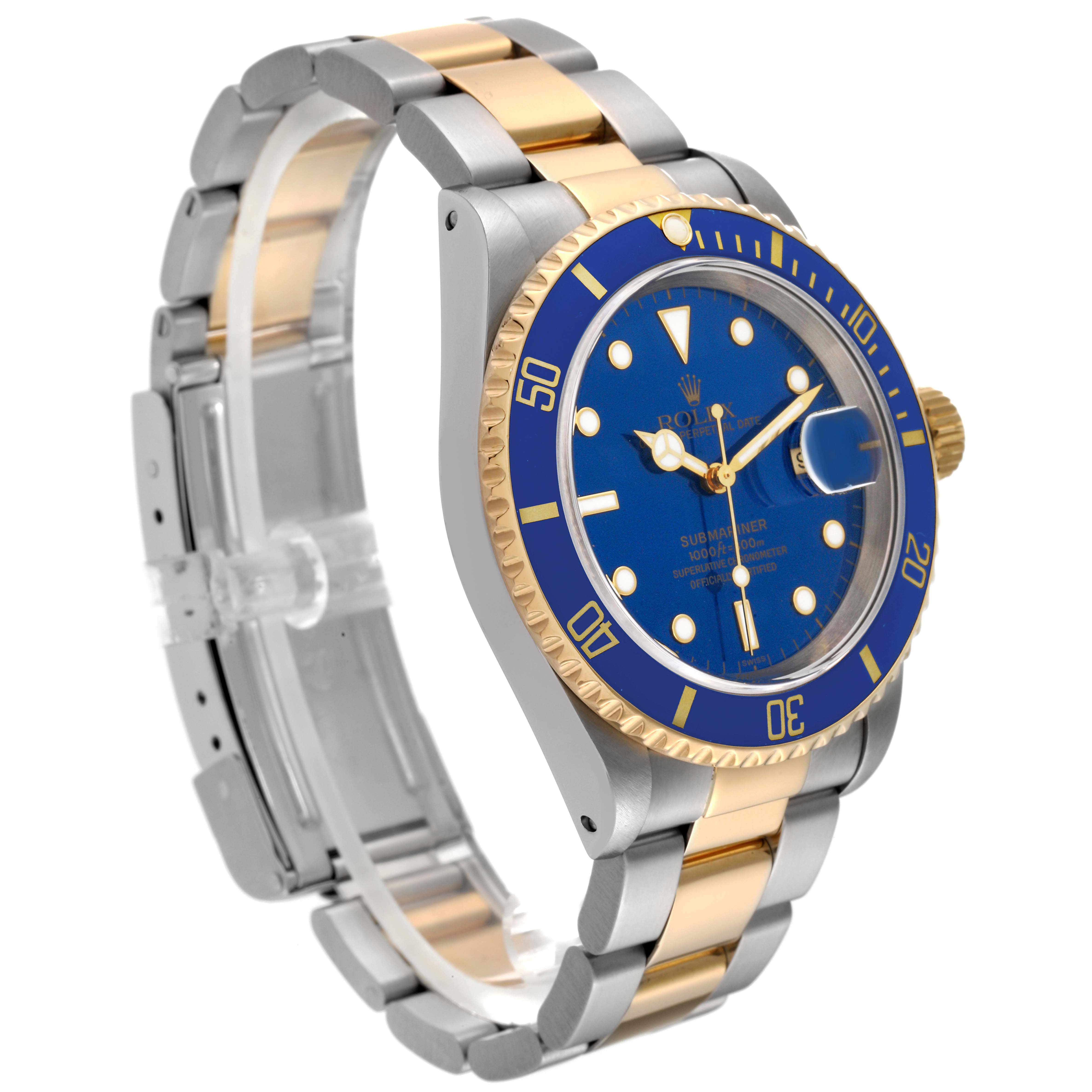 This image shows a Rolex Submariner 16613 Men's Steel and Gold (two tone) Blue Dial 16613 Men's Steel and Gold (two tone) Blue Dial watch at a slight angle, highlighting its blue dial, gold bezel, and silver and gold bracelet.