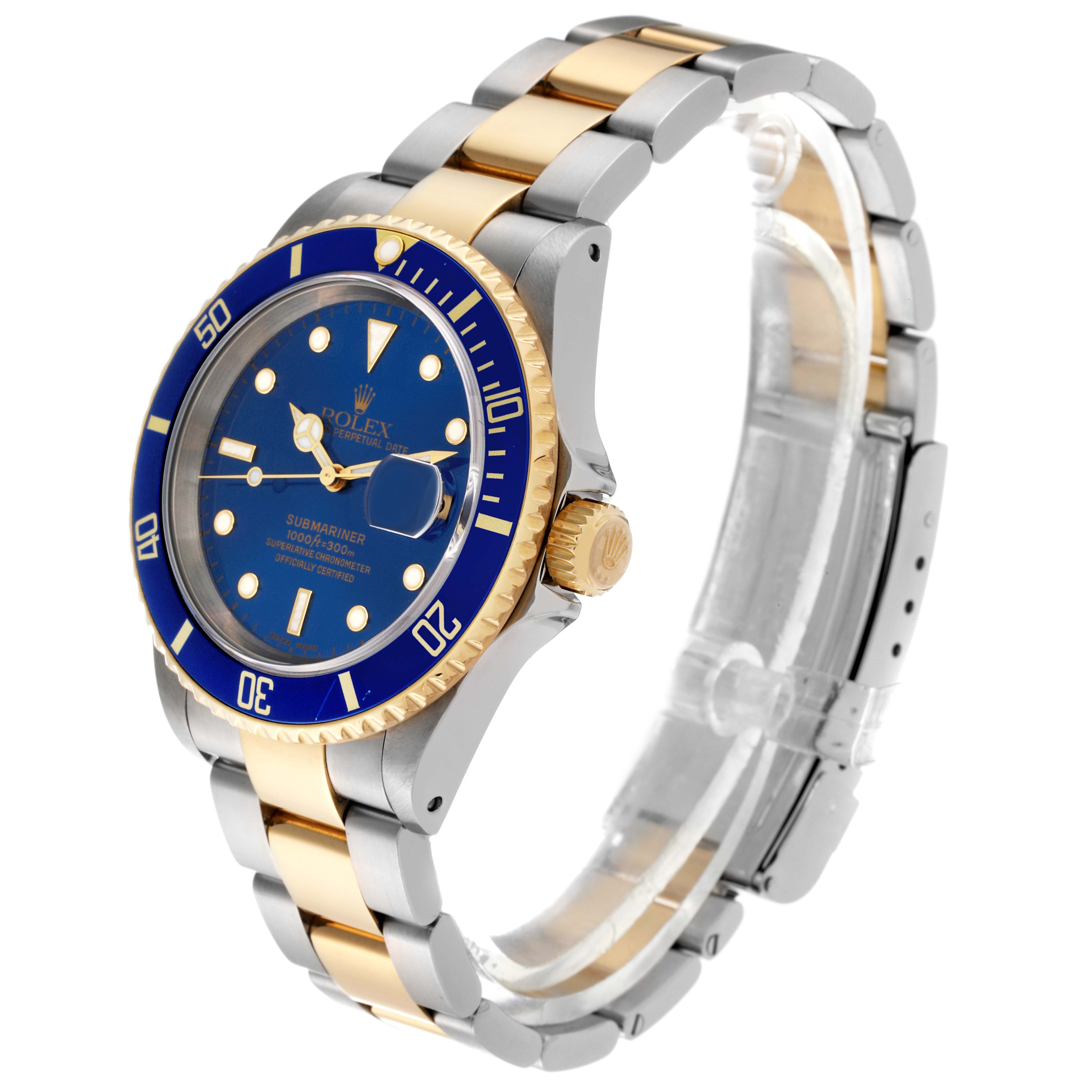 The Rolex Submariner 16613 Men's Steel and Gold (two tone) Blue Dial 16613 Men's Steel and Gold (two tone) Blue Dial watch is shown at a three-quarter angle, highlighting its blue dial, gold bezel, and two-tone metal bracelet.