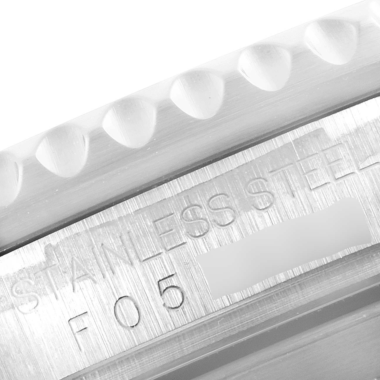 The image shows a close-up of the side engraving and bezel of the Rolex Submariner 16610LV Men
s Stainless Steel Black Dial 16610LV Men
s Stainless Steel Black Dial watch in stainless steel.