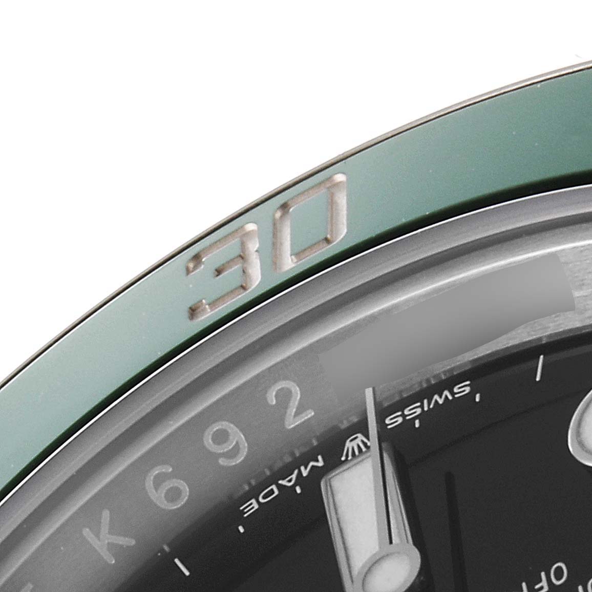 The image shows a close-up of the bezel and part of the dial of a Rolex Submariner 126610LV Men
s Stainless Steel Black Dial 126610LV Men
s Stainless Steel Black Dial watch.