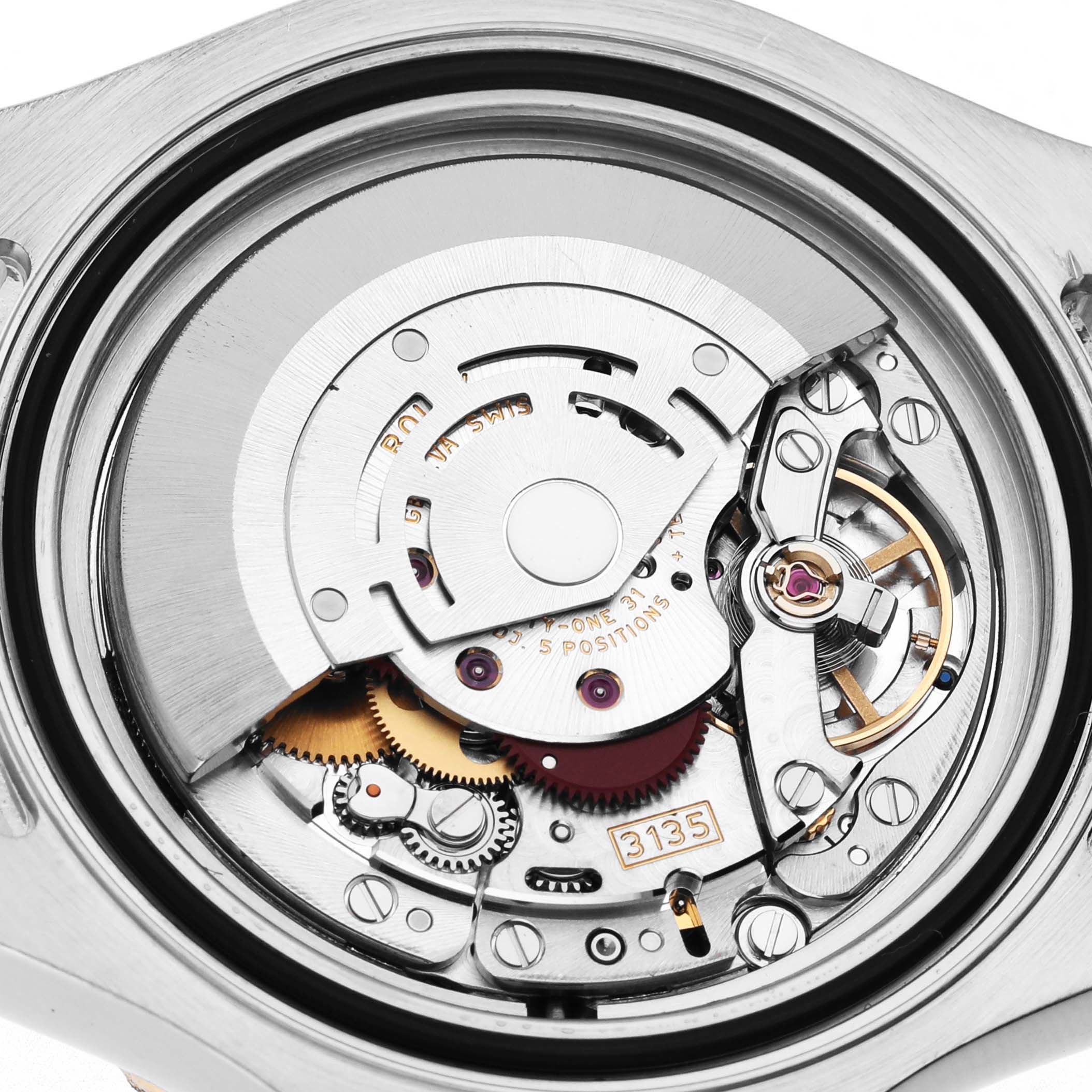 The image shows the movement mechanism of a Rolex Yacht-Master 16623 Men's Steel and Gold (two tone) Grey Dial, viewed from a back angle.