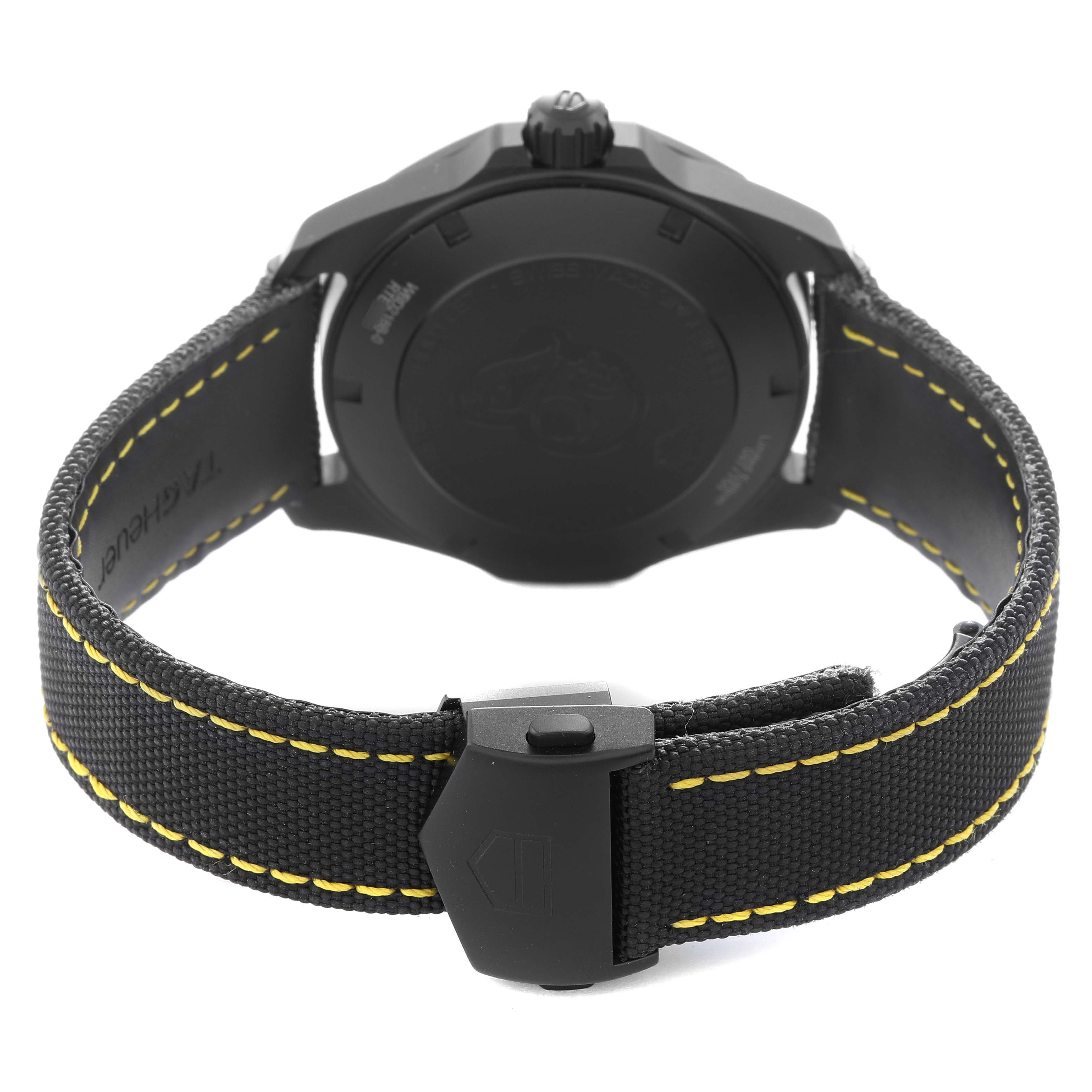 The image shows the back view of a Tag Heuer Aquaracer WBD218B.FC6446 Men
s Titanium Black Dial WBD218B.FC6446 Men
s Titanium Black Dial watch, highlighting the case back, strap, and buckle.