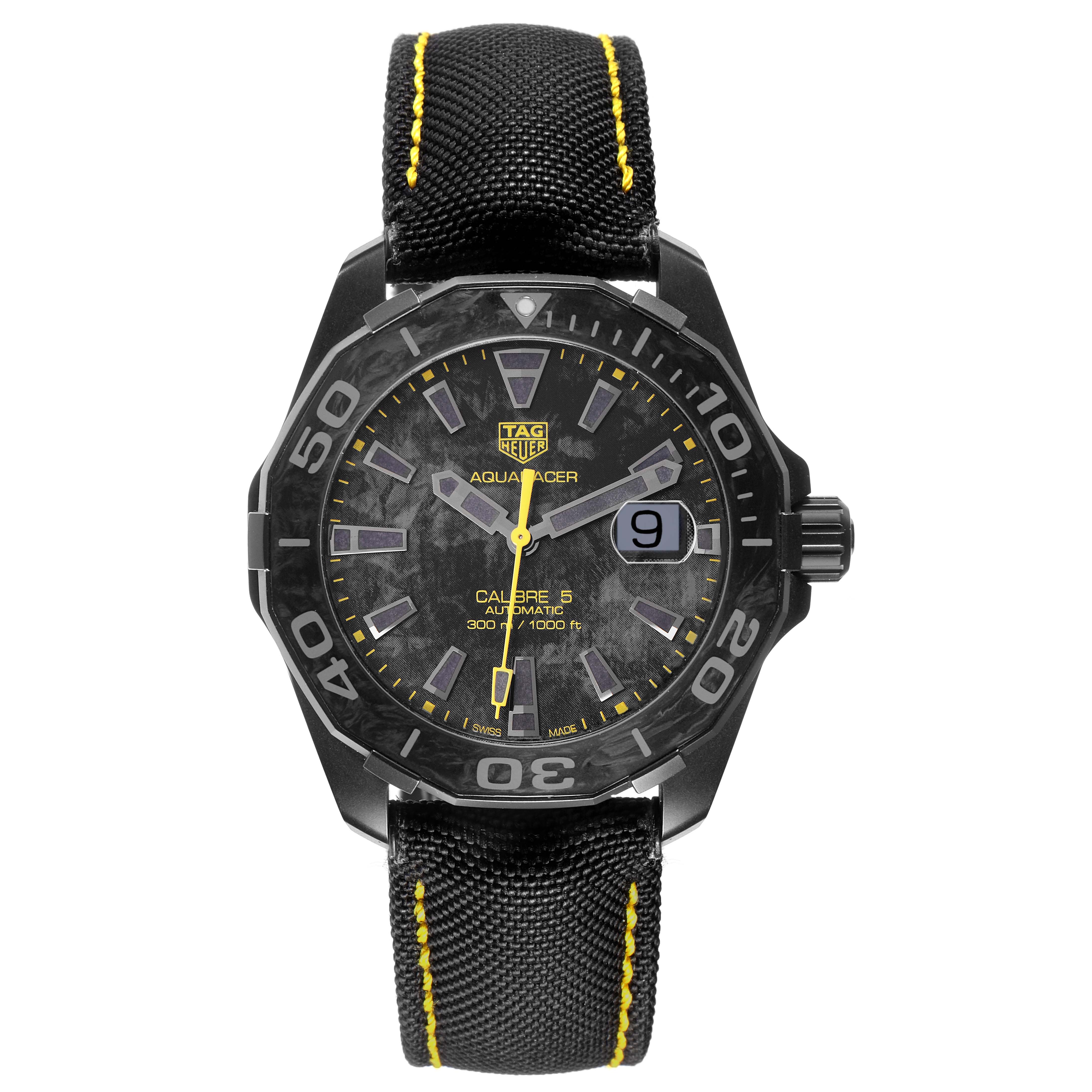 The Tag Heuer Aquaracer WBD218B.FC6446 Men
s Titanium Black Dial WBD218B.FC6446 Men
s Titanium Black Dial watch is shown from a front view, highlighting the dial, bezel, and strap with yellow stitching.